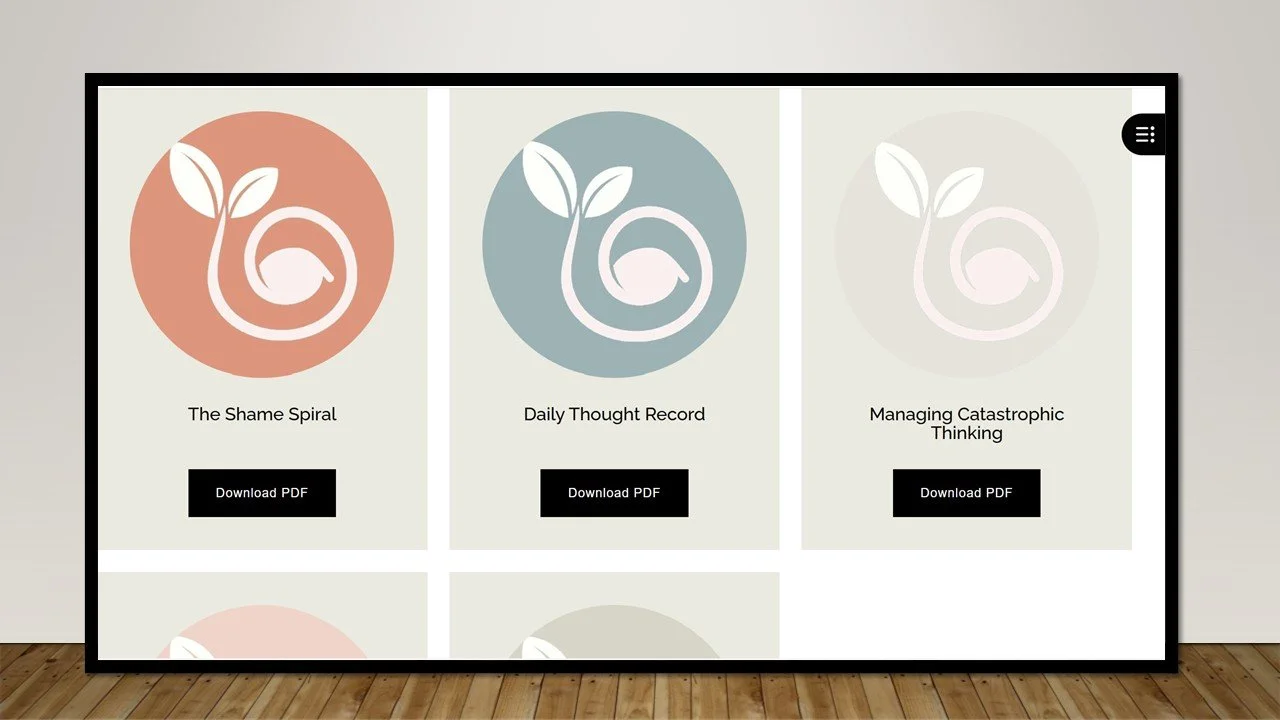 A digital menu or webpage featuring three titles with icons: 'The Shame Spiral,' 'Daily Thought Record,' and 'Managing Catastrophic Thinking.' Each has a 'Download PDF' button below.