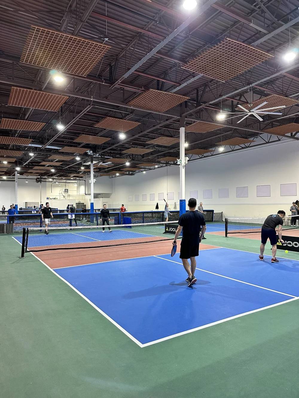 Players in a game on the Rockii courts