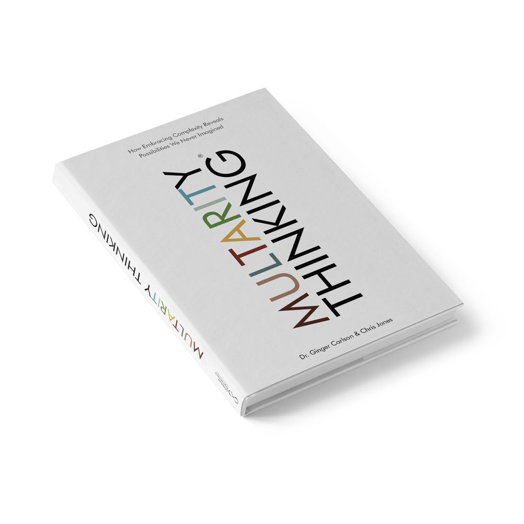 Book titled "Multarity Thinking" by Dr. Ginger Carlson and Chris Jones, lying on a white surface with a shadow underneath.