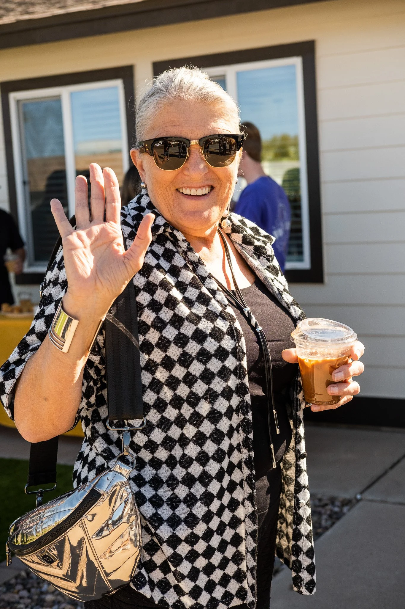Guest enjoying handcrafted latte from Best Buds Coffee mobile cart.