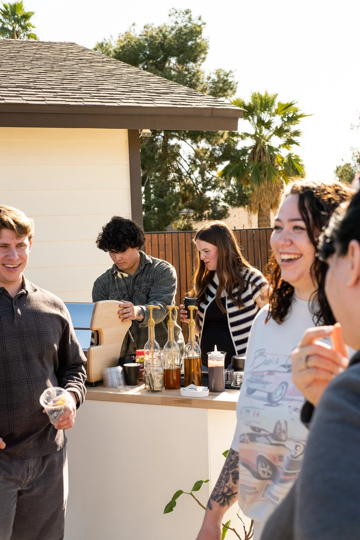Guests enjoying handcrafted lattes from Best Buds Coffee mobile cart.