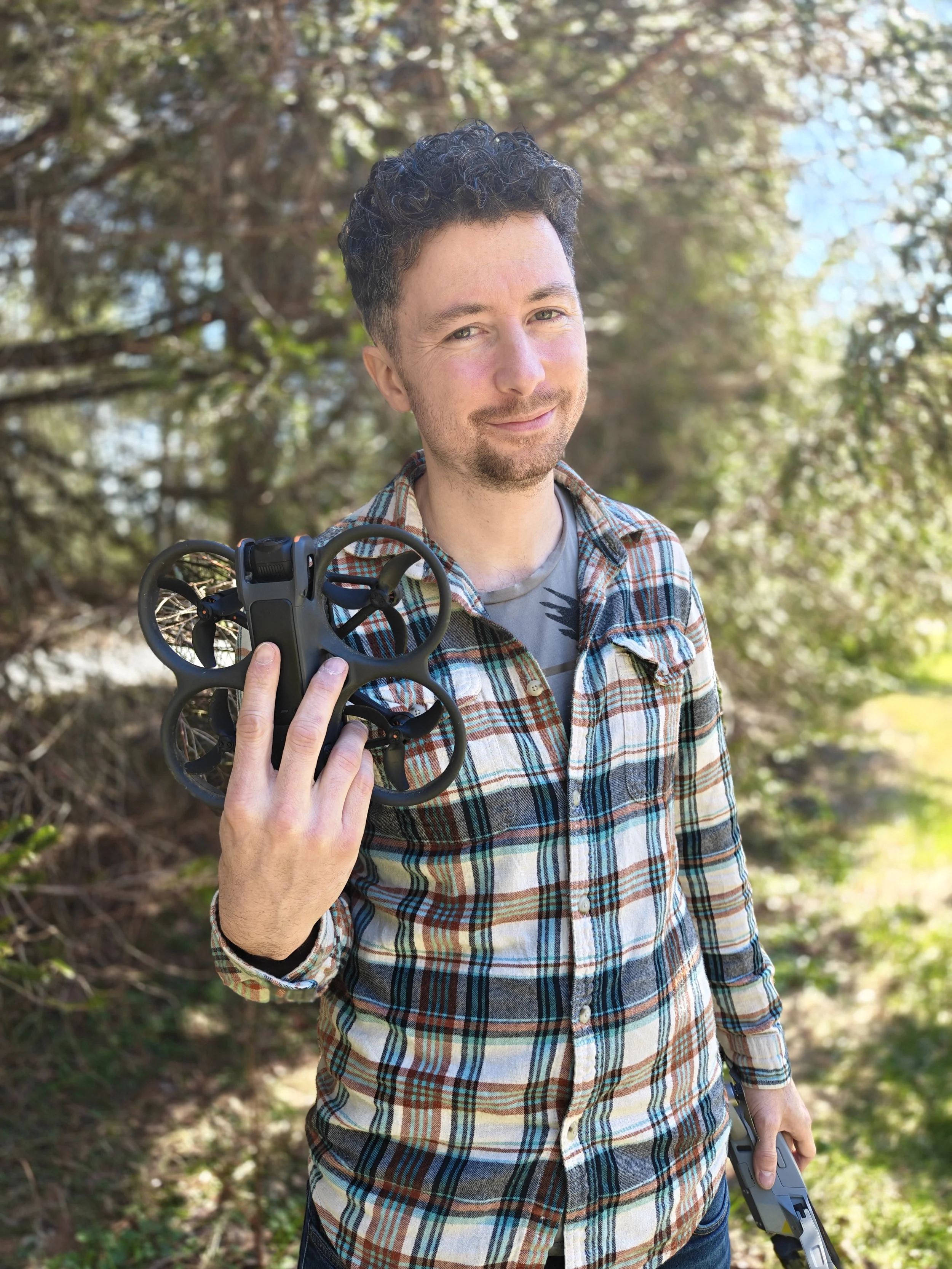 Mark Hylases poses with his Avata 3 FPV drone.