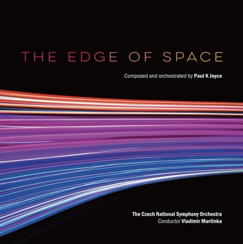 Album cover for "The Edge of Space" composed and orchestrated by Paul K Joyce, performed by the Czech National Symphony Orchestra conducted by Vladimir Martinka, featuring colorful light trails against a black background.