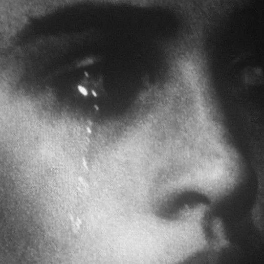 Sensitive man reflecting on emotions, mental health, and emotional wellness