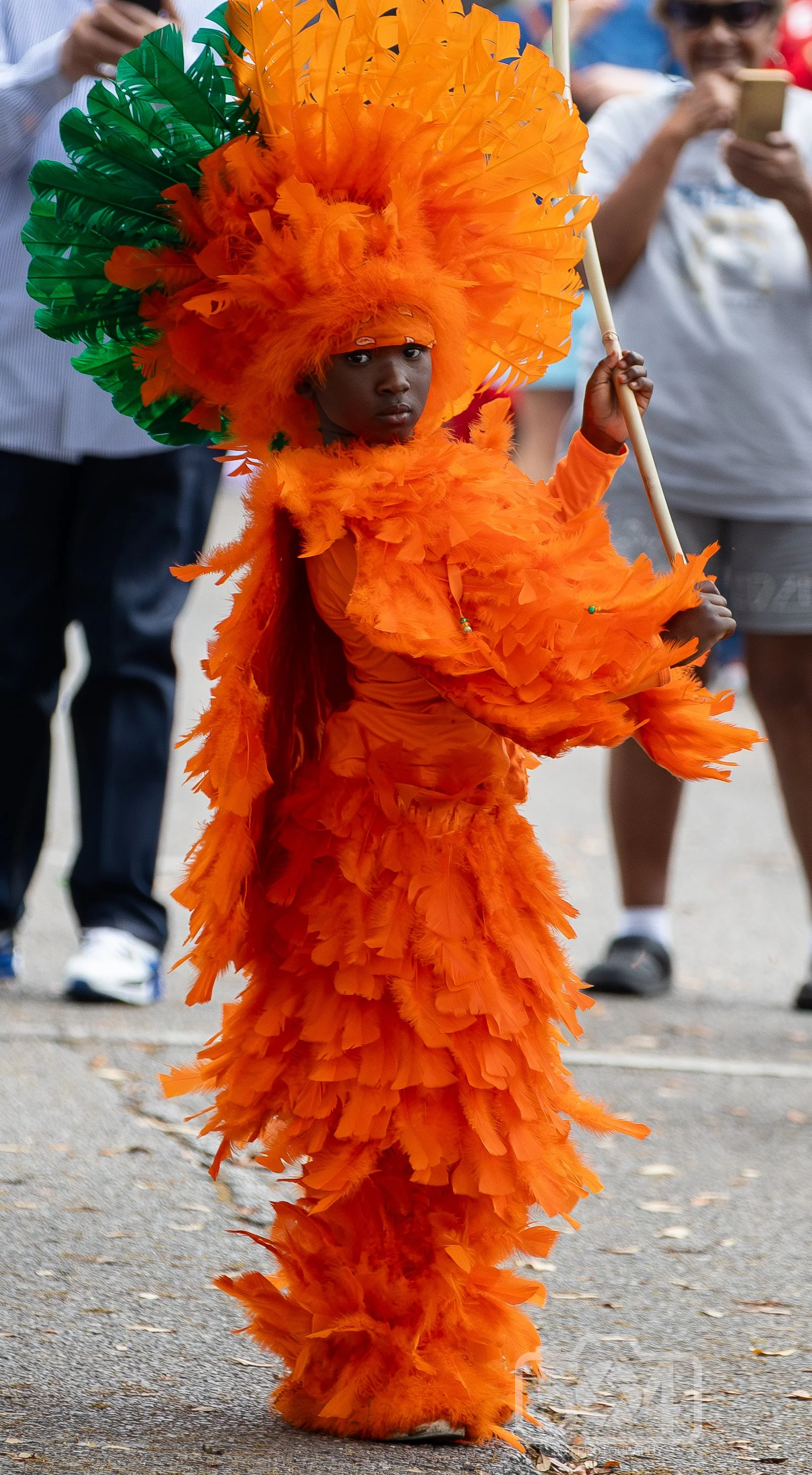 child in orange and green.jpg