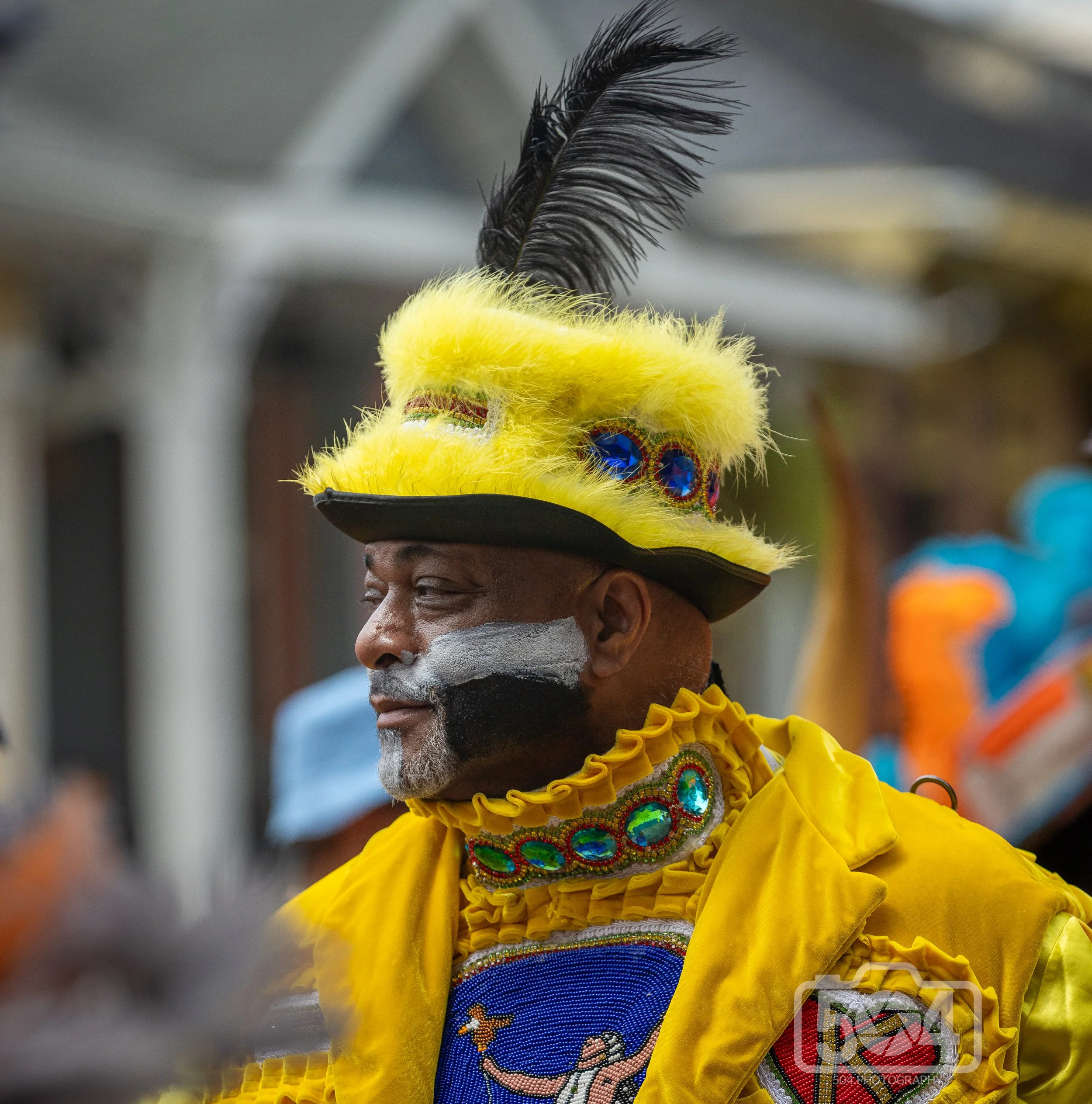 man in yellow and feather.jpg
