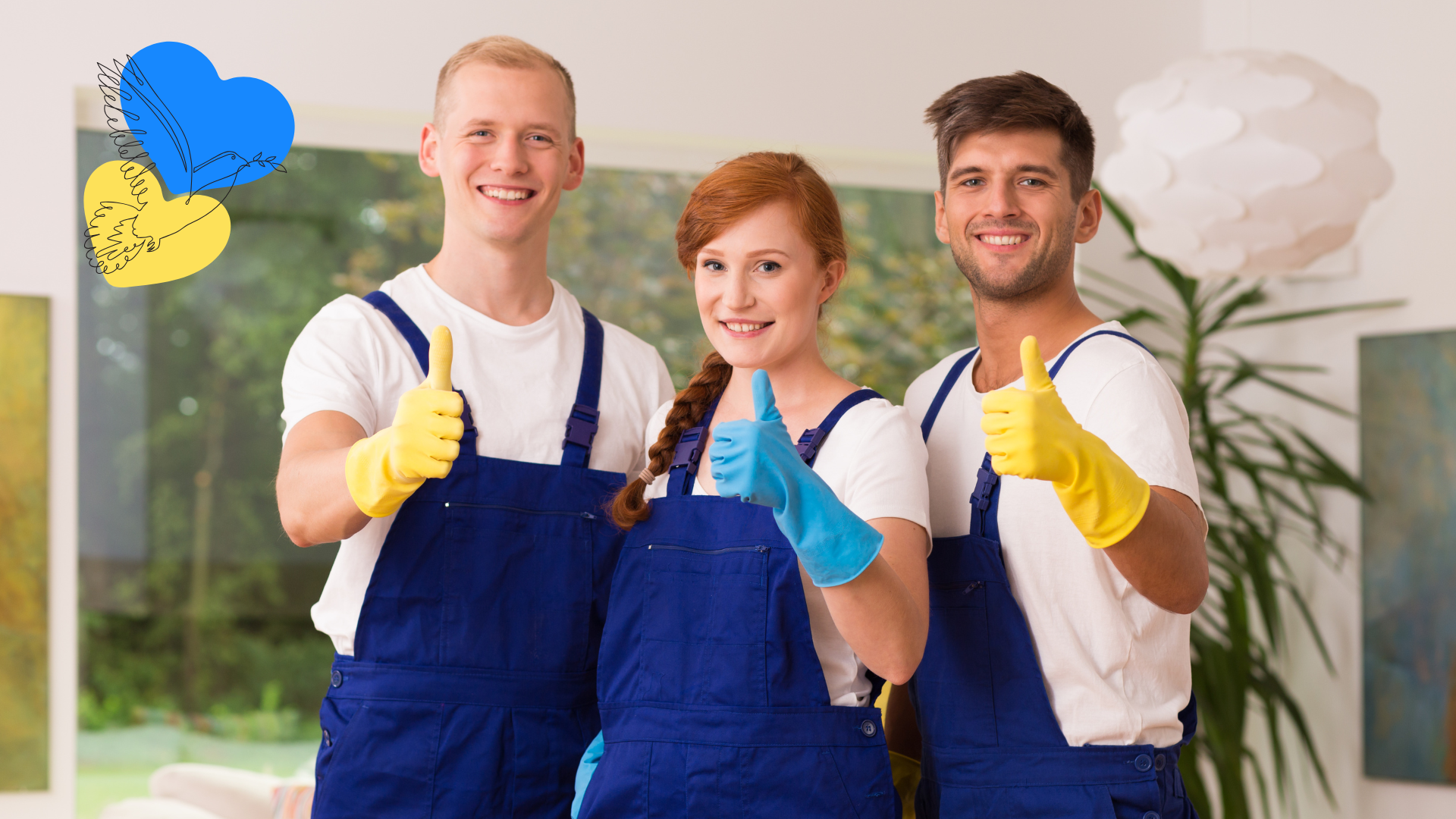 Three young people smiling and giving thumbs up, wearing white shirts, blue overalls, and yellow and blue gloves, standing indoors with large windows and a plant behind them.