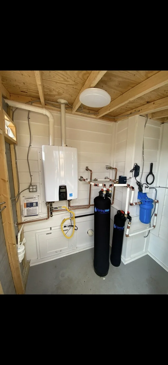 Tankless water heater and whole-house water treatment installation by A2 Plumbing in San Antonio