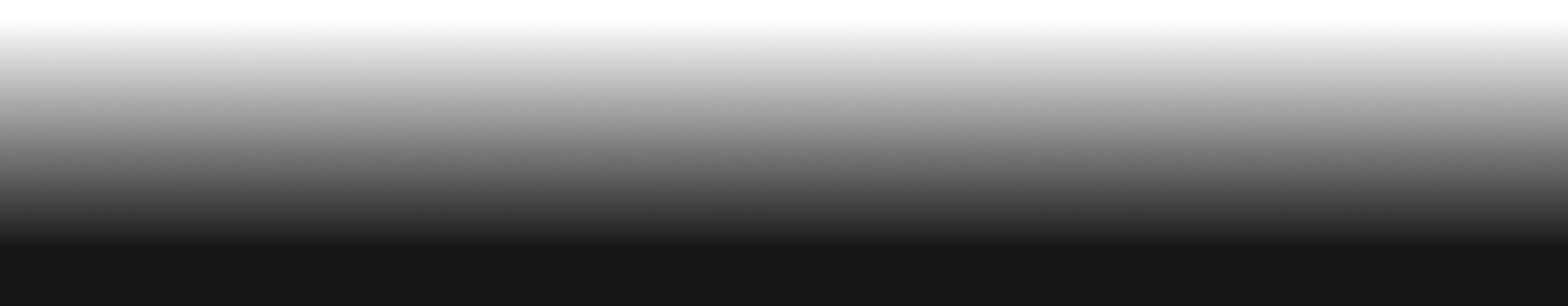 Close-up of a black camera lens with reflections.