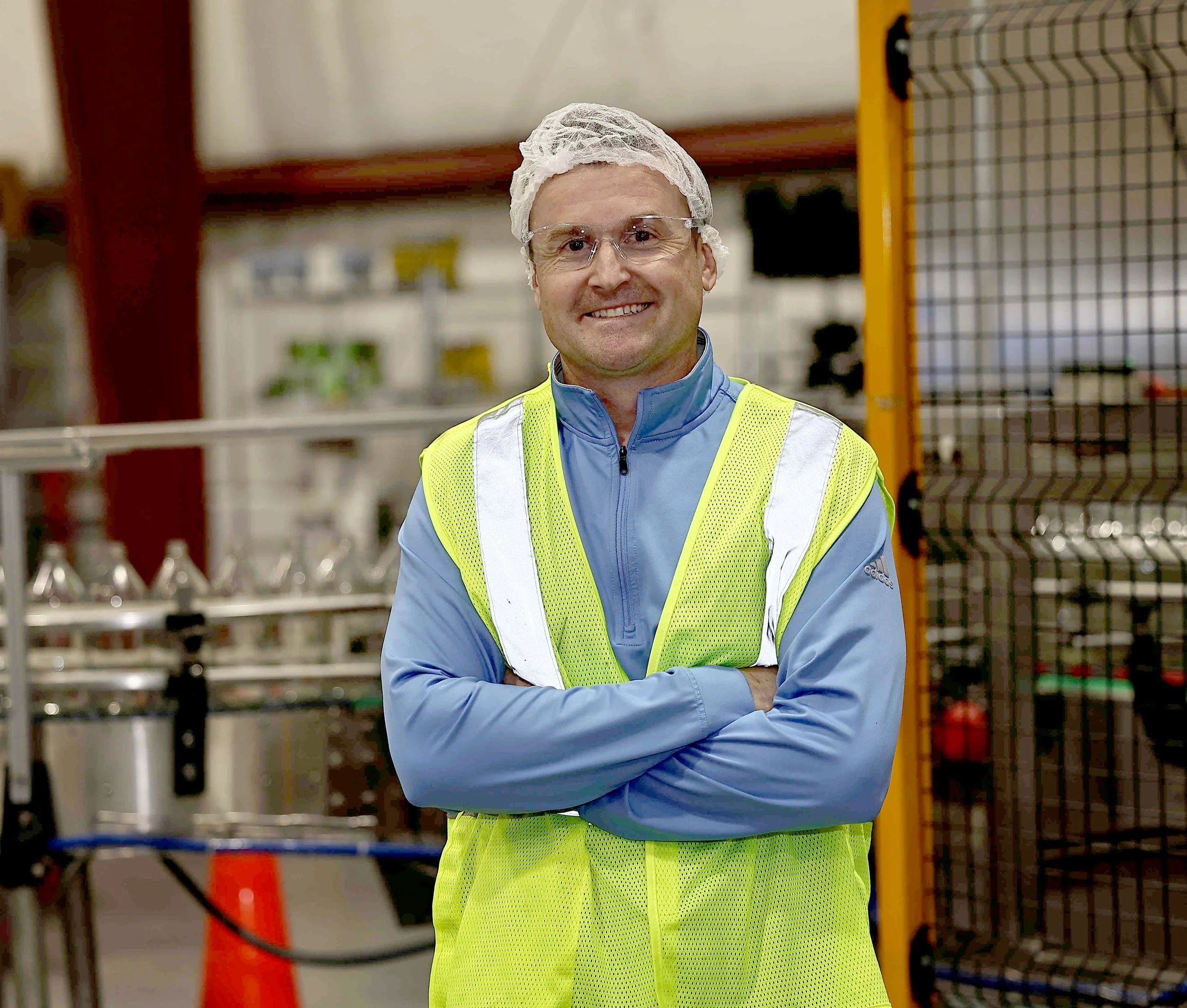 Smiling Employee in PPE