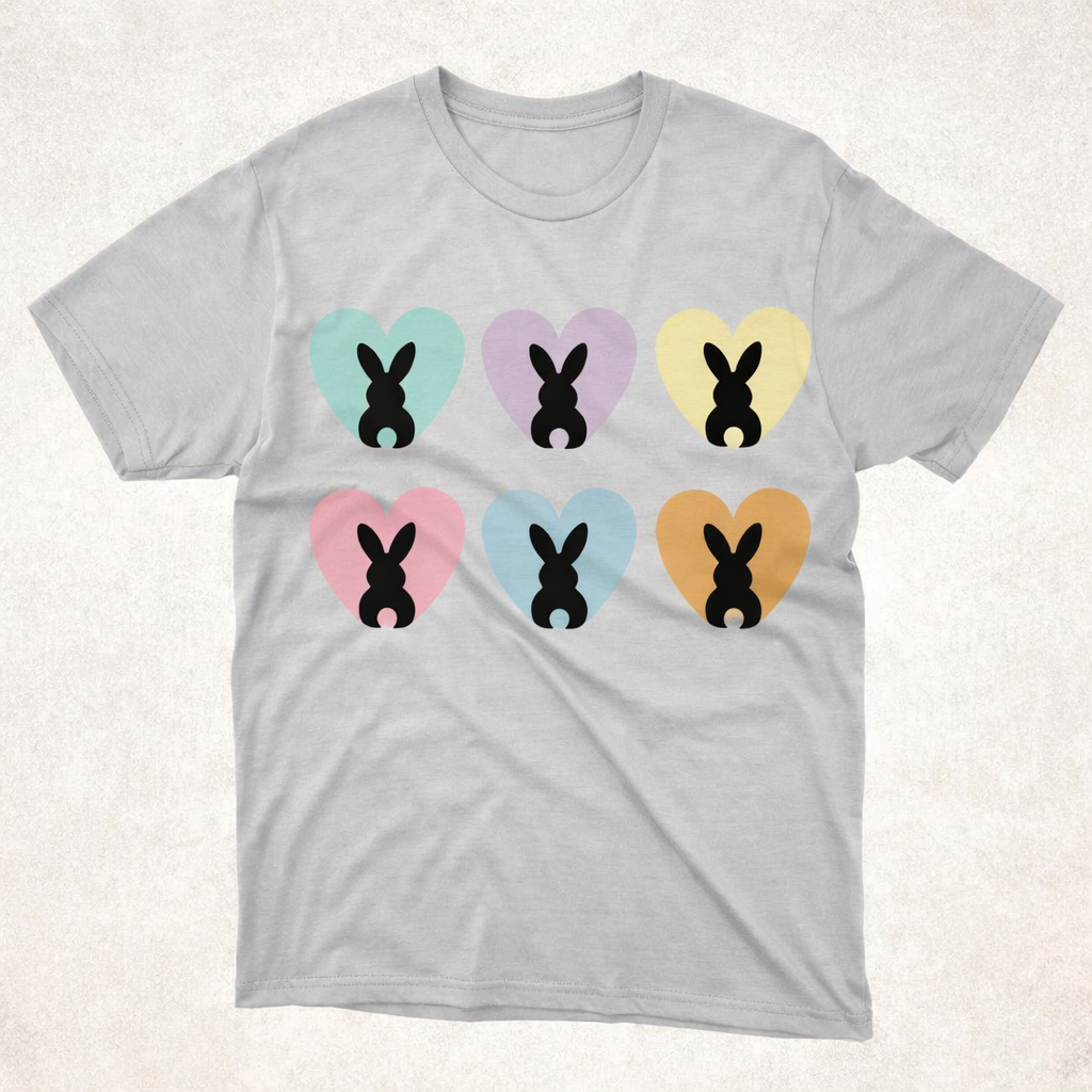 Pastel bunnies on a gray T-shirt.png