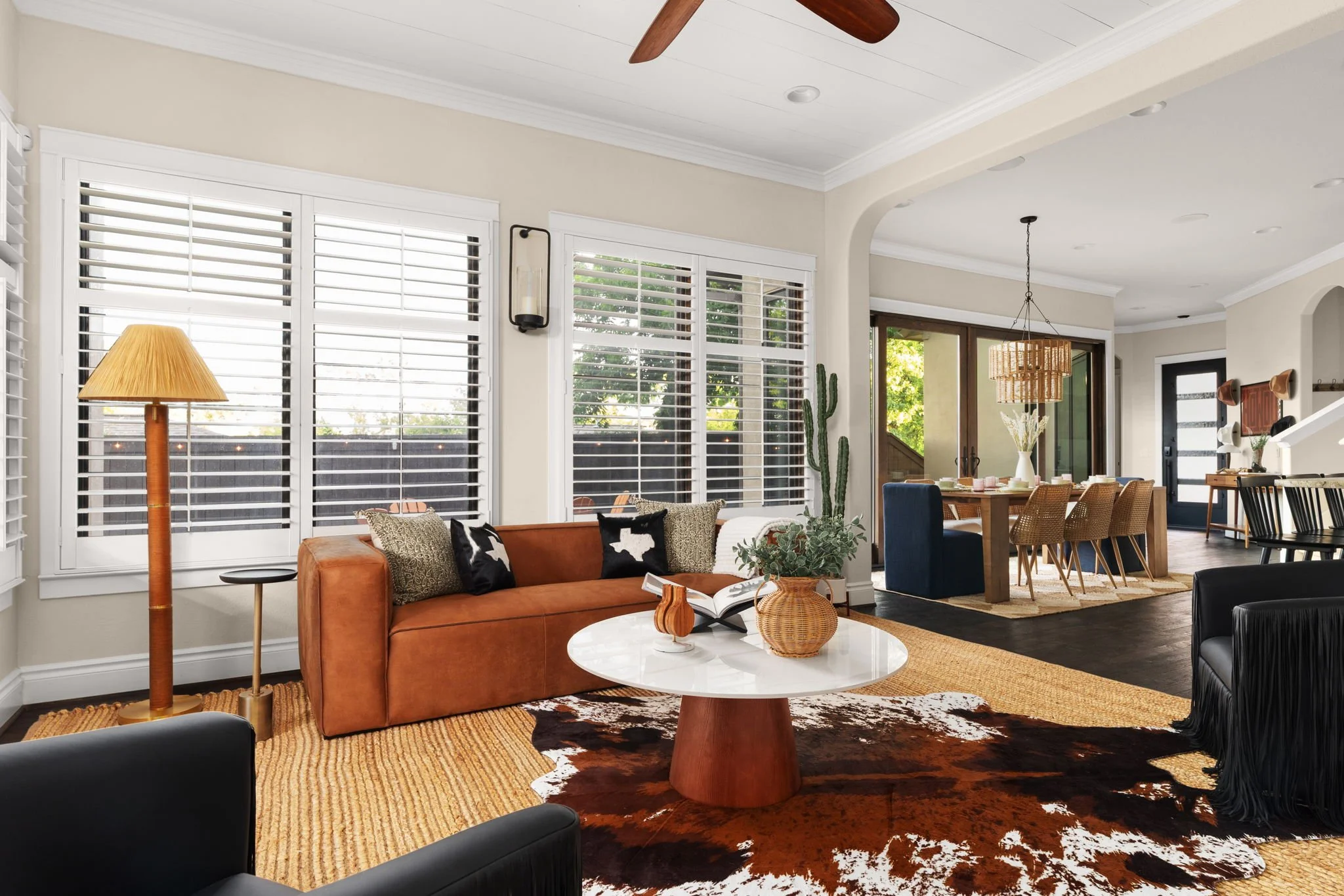 A modern Western-inspired living room designed for a short-term rental