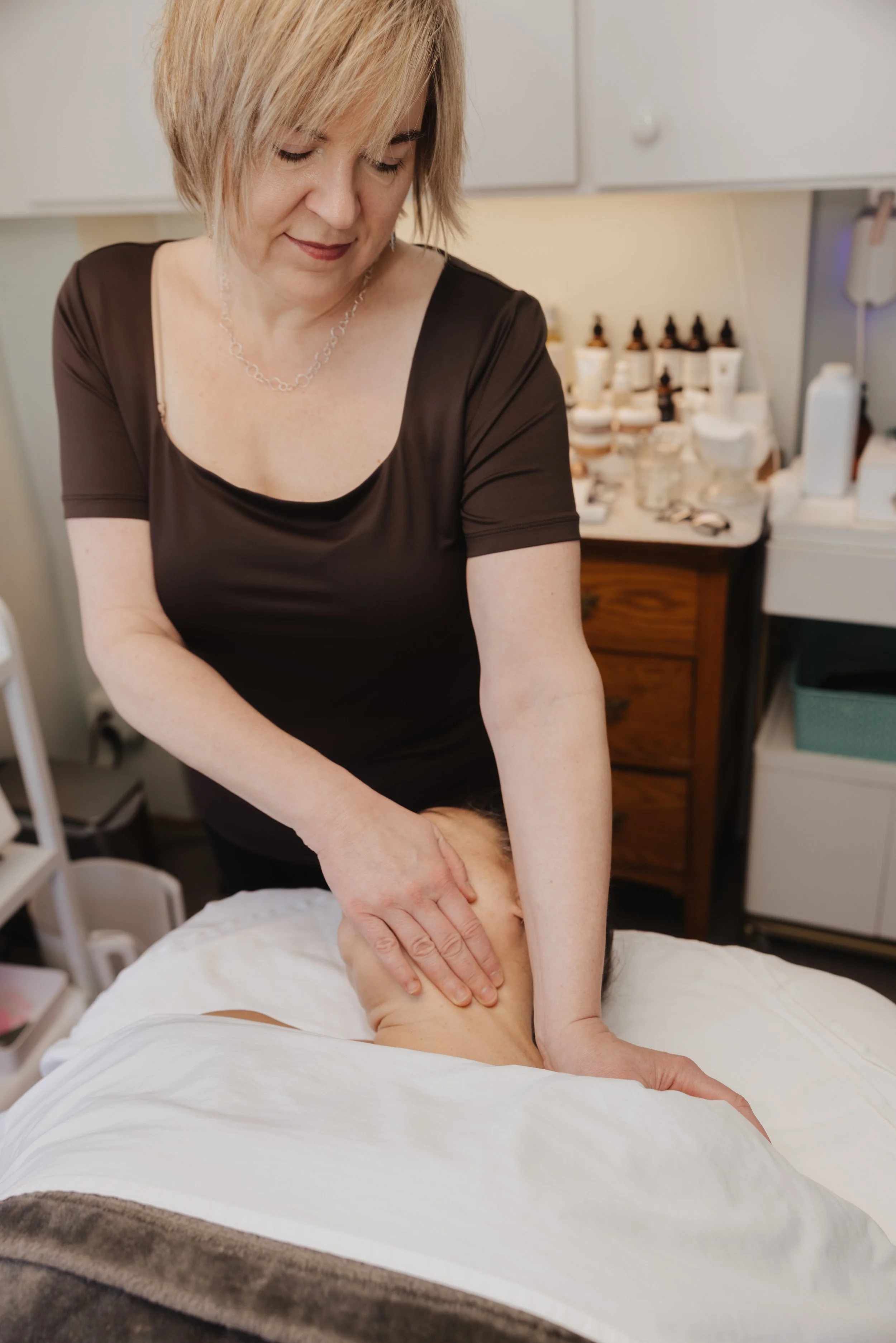 Clean, professional medical spa treatment room with neutral tones at Serene Solutions By KT in Providence