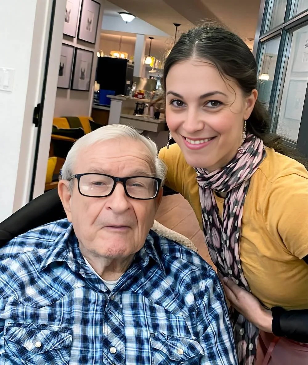 Emily Ricca ballet artist connecting with senior community resident during live ballet outreach performance at senior living community