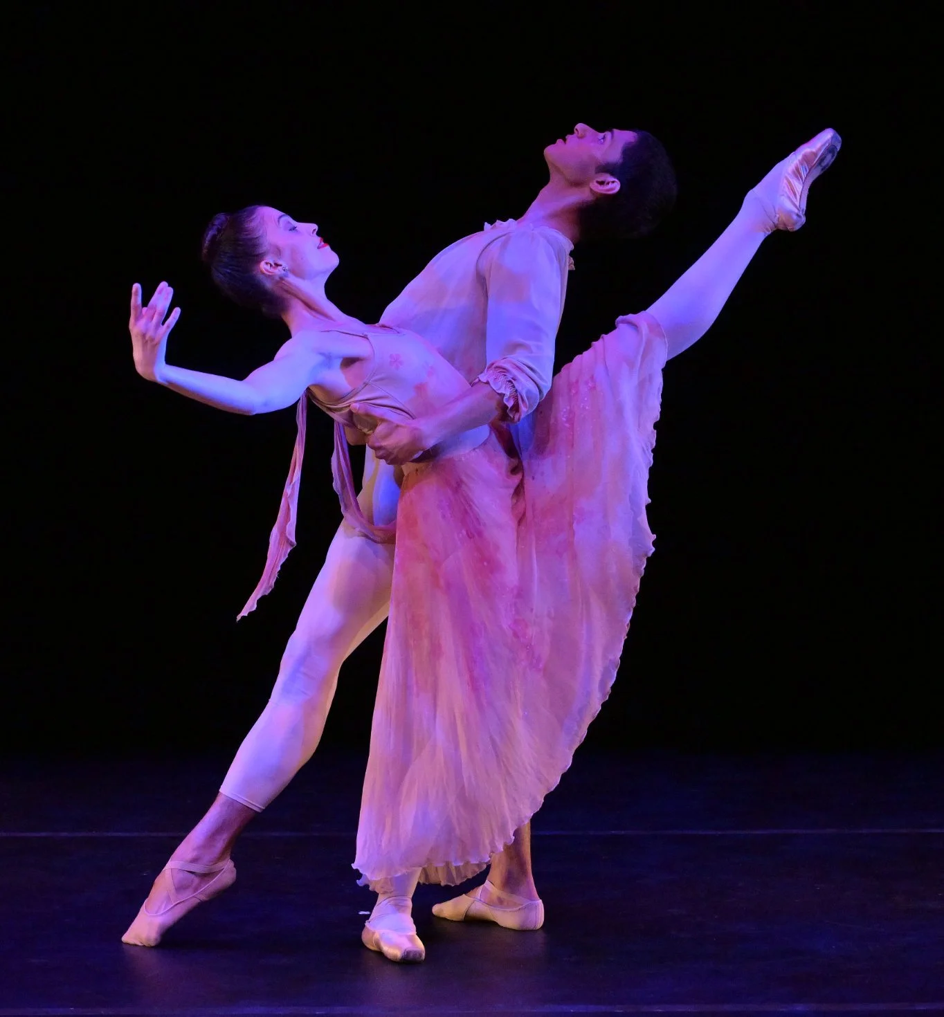 Emily Ricca professional ballet dancer performing classical pas de deux on stage