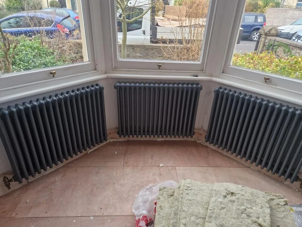 Double column radiator installation in Westbury-on-Trym with upgraded heating pipework