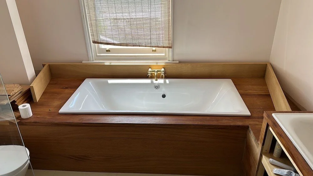 Bespoke bath installation with custom oak frame completed in Clifton Bristol