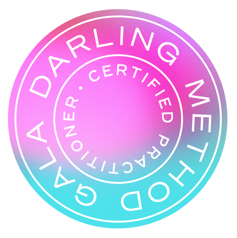 Circular badge with gradient colors from pink to purple and blue, reading 'GALA DARLING, THE WORLD'S CERTIFIED PARLOR' in white text.