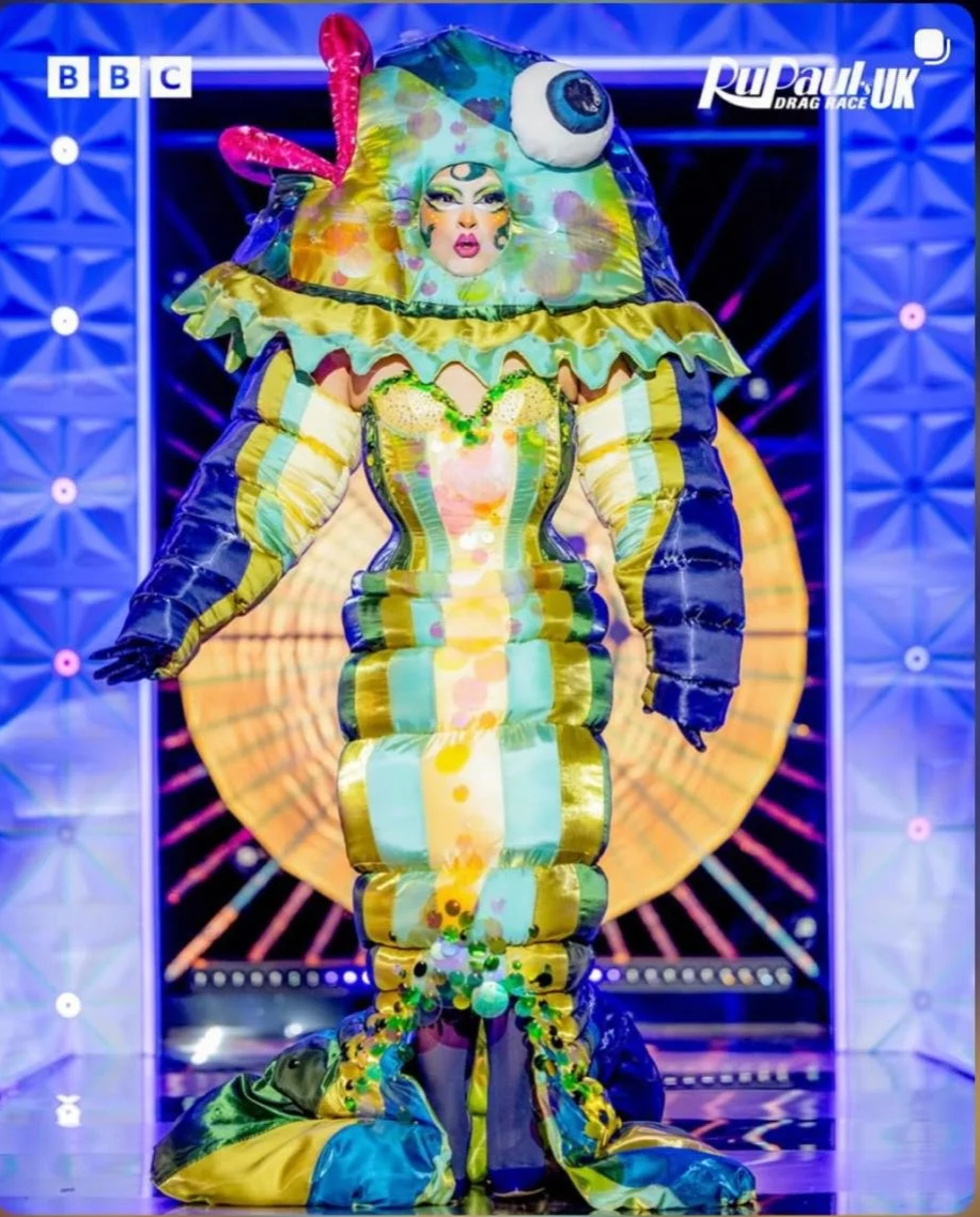 Mocha for Ru Paul’s Drag Race ‘Kitsch’ runway. Wearing custom big fish ensemble. 