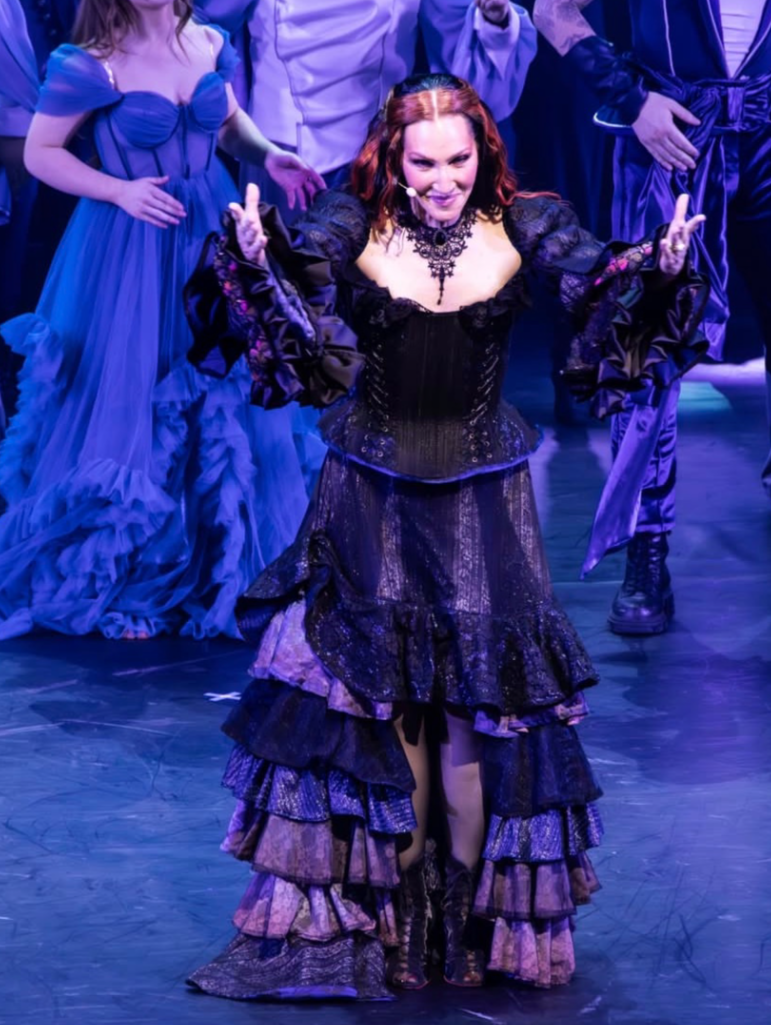 Michelle Visage wearing custom Tante Hansa corset, skirt and sleeves in Sea Witch the Musical. 