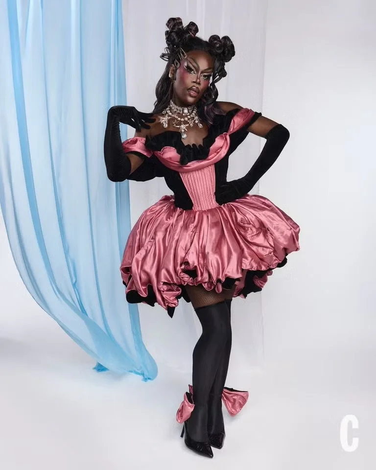 Nyongbella wearing custom William. F. Henderson Dior inspired corset and skirt for Cosmopolitan Magazine. Shot by Vic Lentaigne. 
