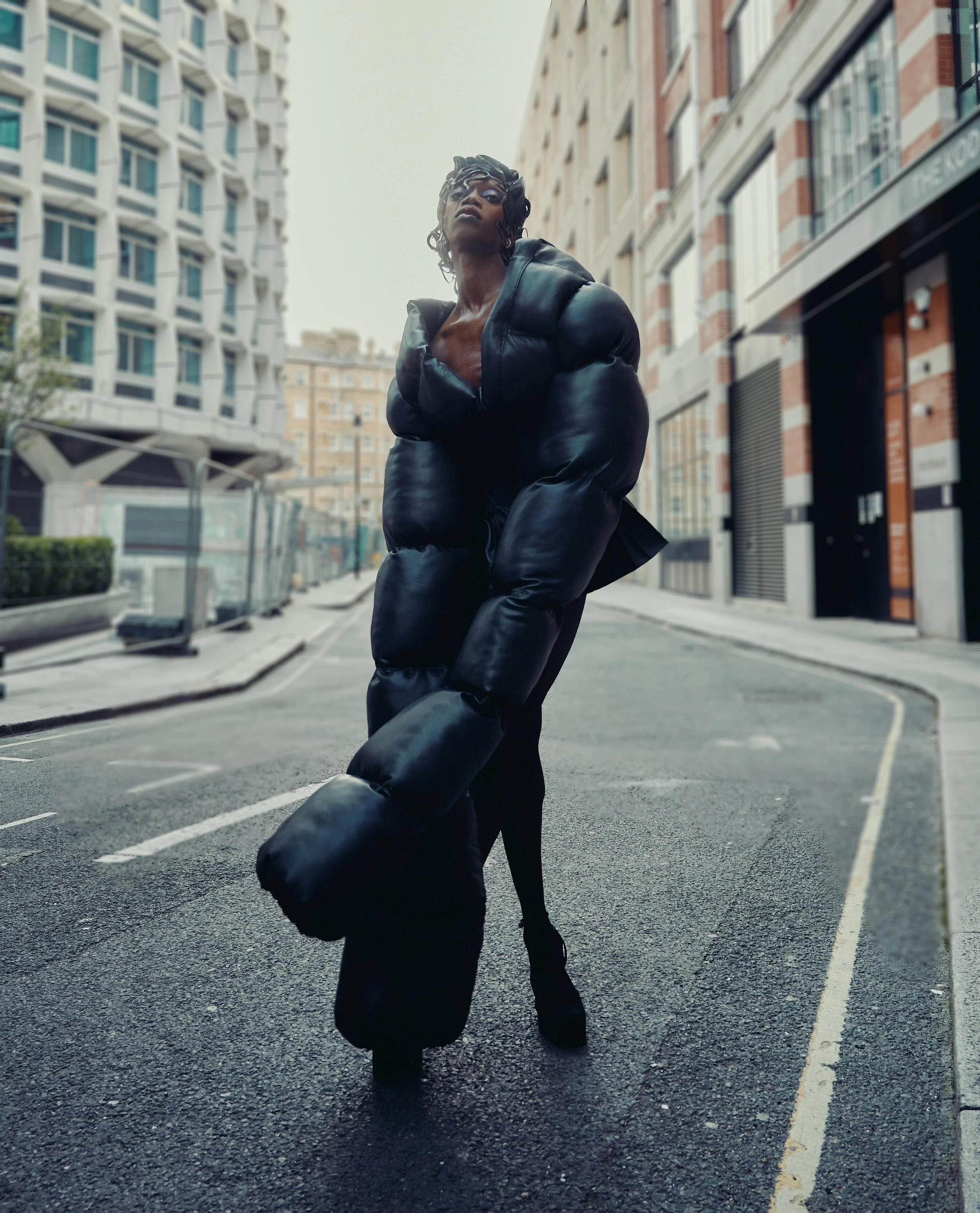 Black Peppa in ‘Black Puffer one-piece’ 
shot by Kim Lang