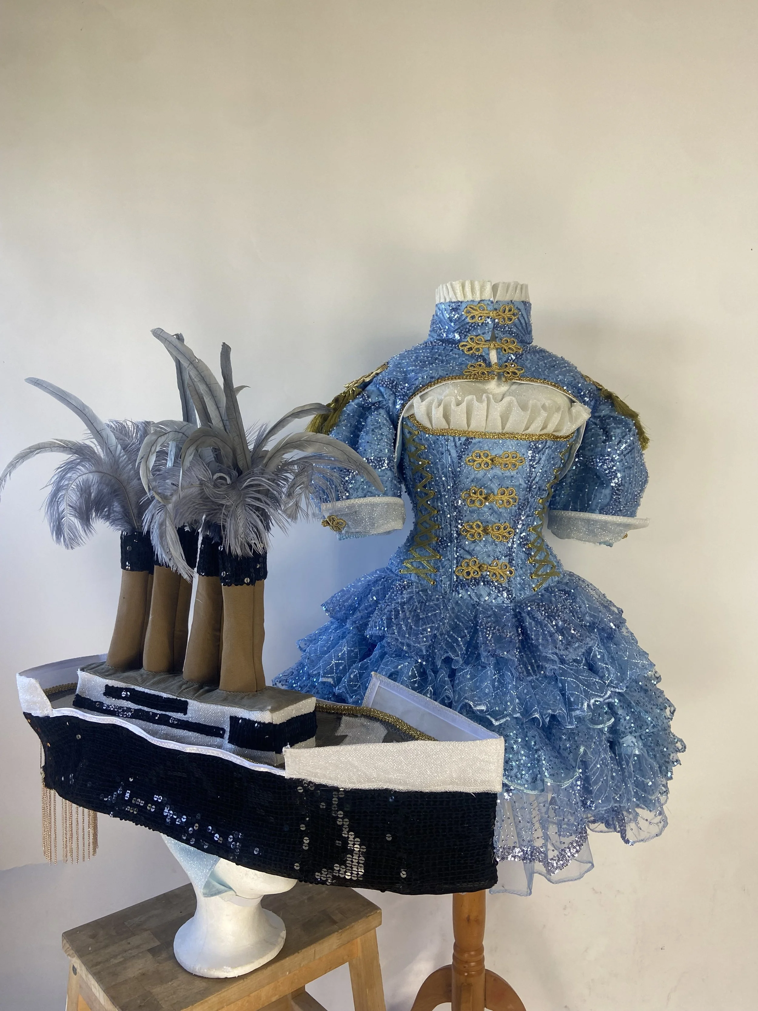 Custom ‘Titanique’ Hourglass, Skirt and Jacket for Juliet Mayhew's appearance on Titanique (as seen on Real Housewives of London) with matching custom ship headpiece. Shot by William. F. Henderson.
