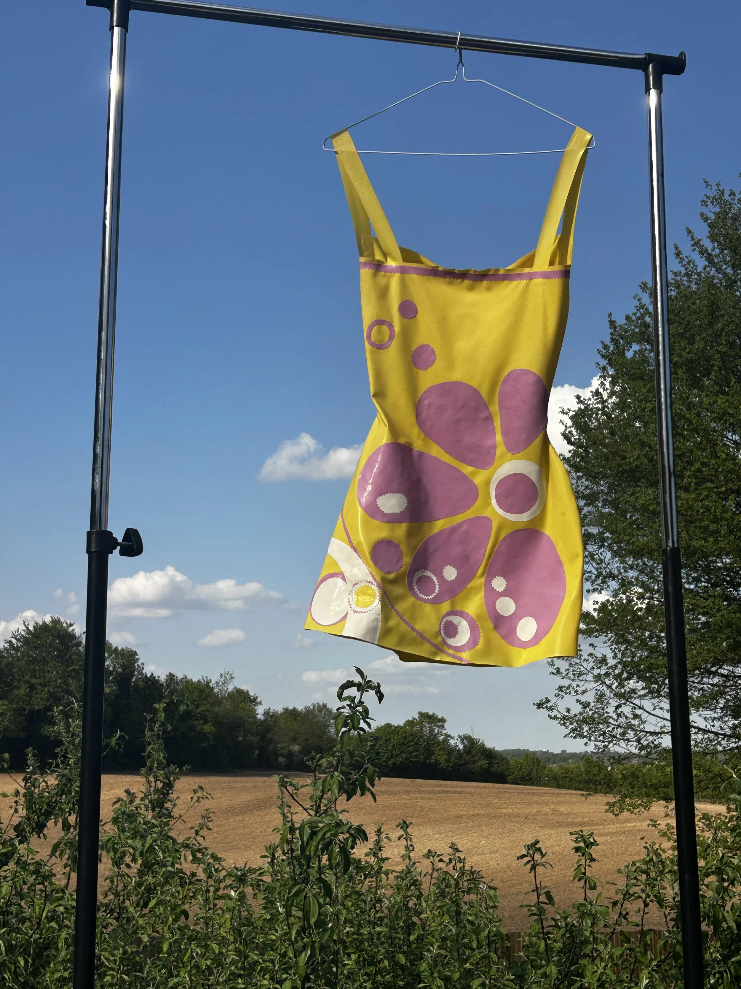 Kikiara yellow and lilac Bunni slip dresses.