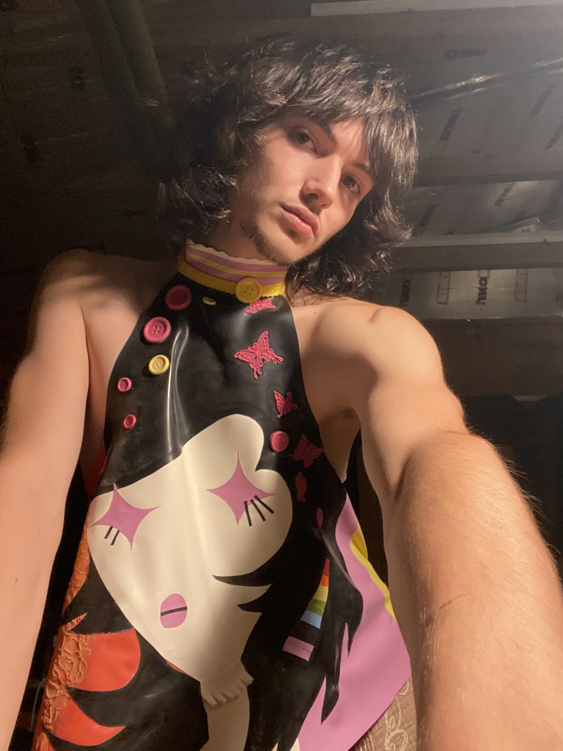 William. F. Henderson wearing the Marceline latex halter neck top. 