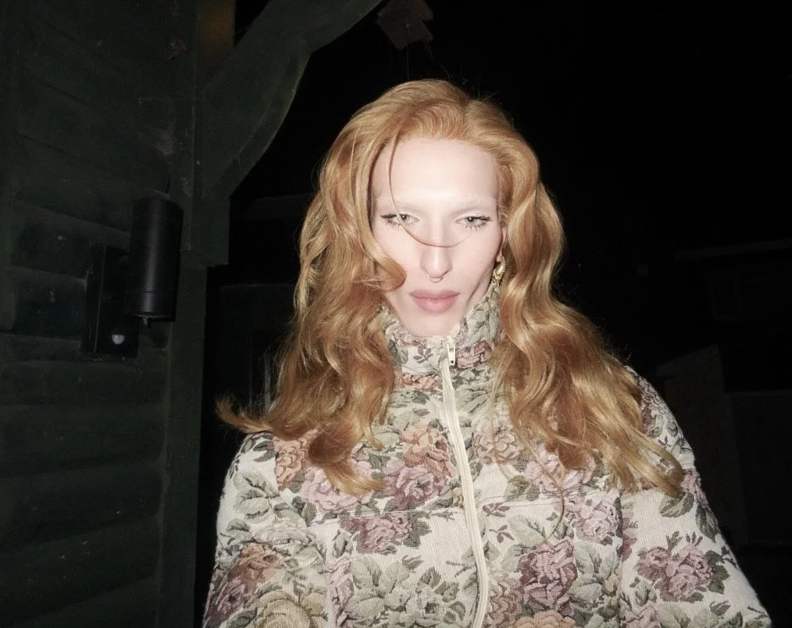 Naomi Rush wearing the floral puffer jacket. 