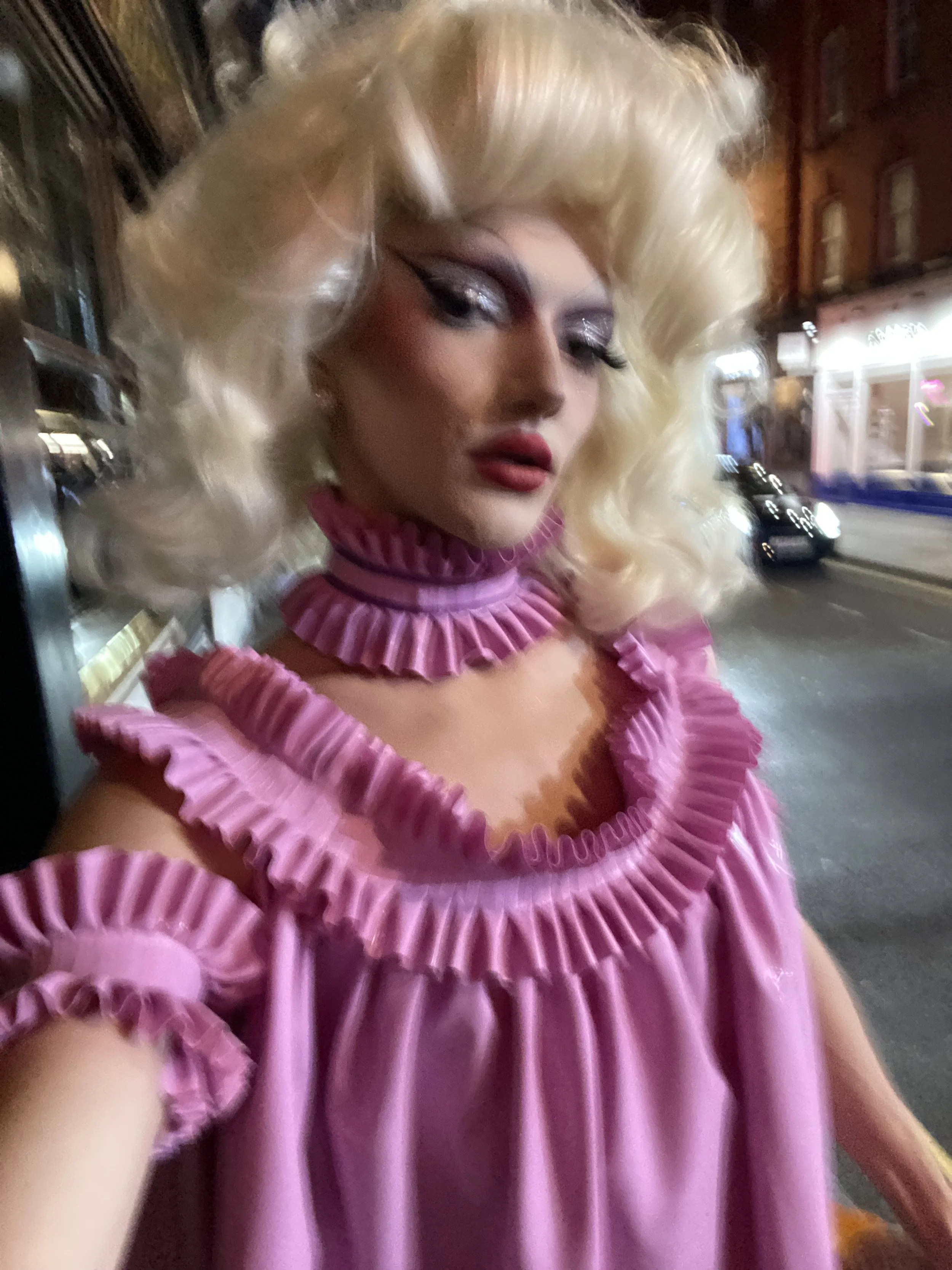 William. F. Henderson wearing the Lilac Maude top with matching neck ruffle and armbands. [available in shop]