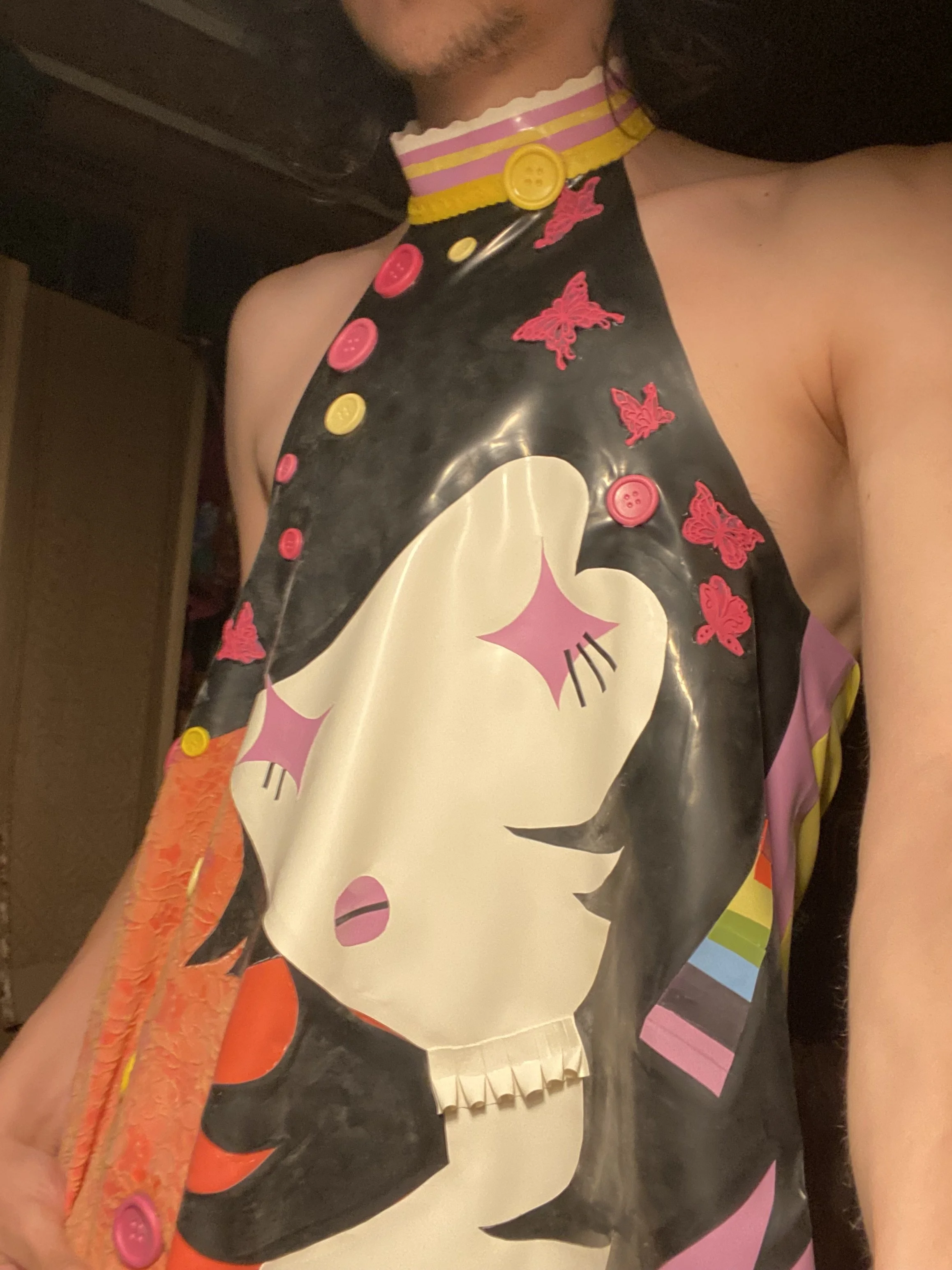 William. F. Henderson wearing the Marceline latex halter neck top. 