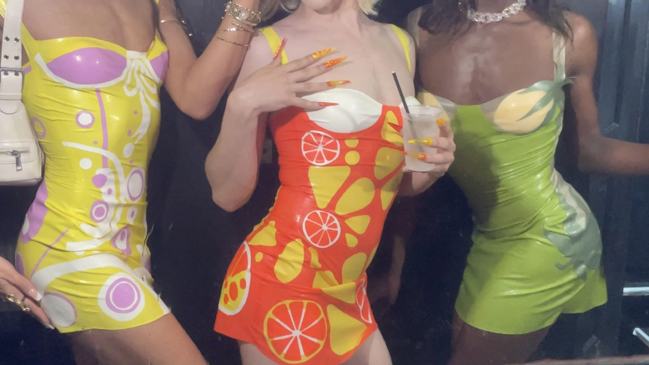 Mode girls all wearing latex Bunni slip dress.