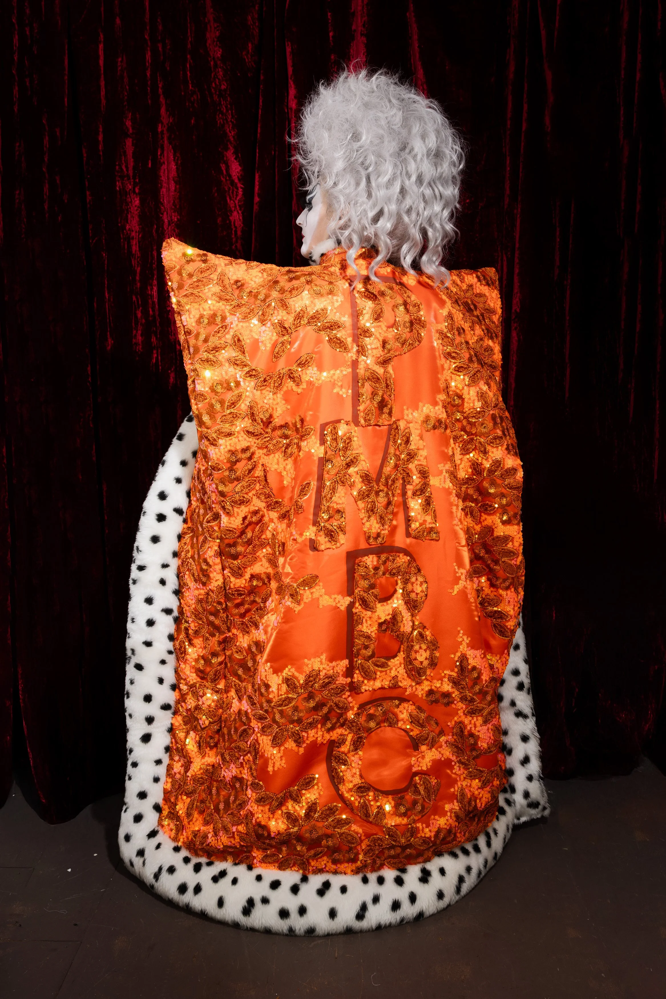 PMBC wearing the Royal Orange and Dalmatian Cape. Shot by Jennifer Forward - Hayter and James Klug.