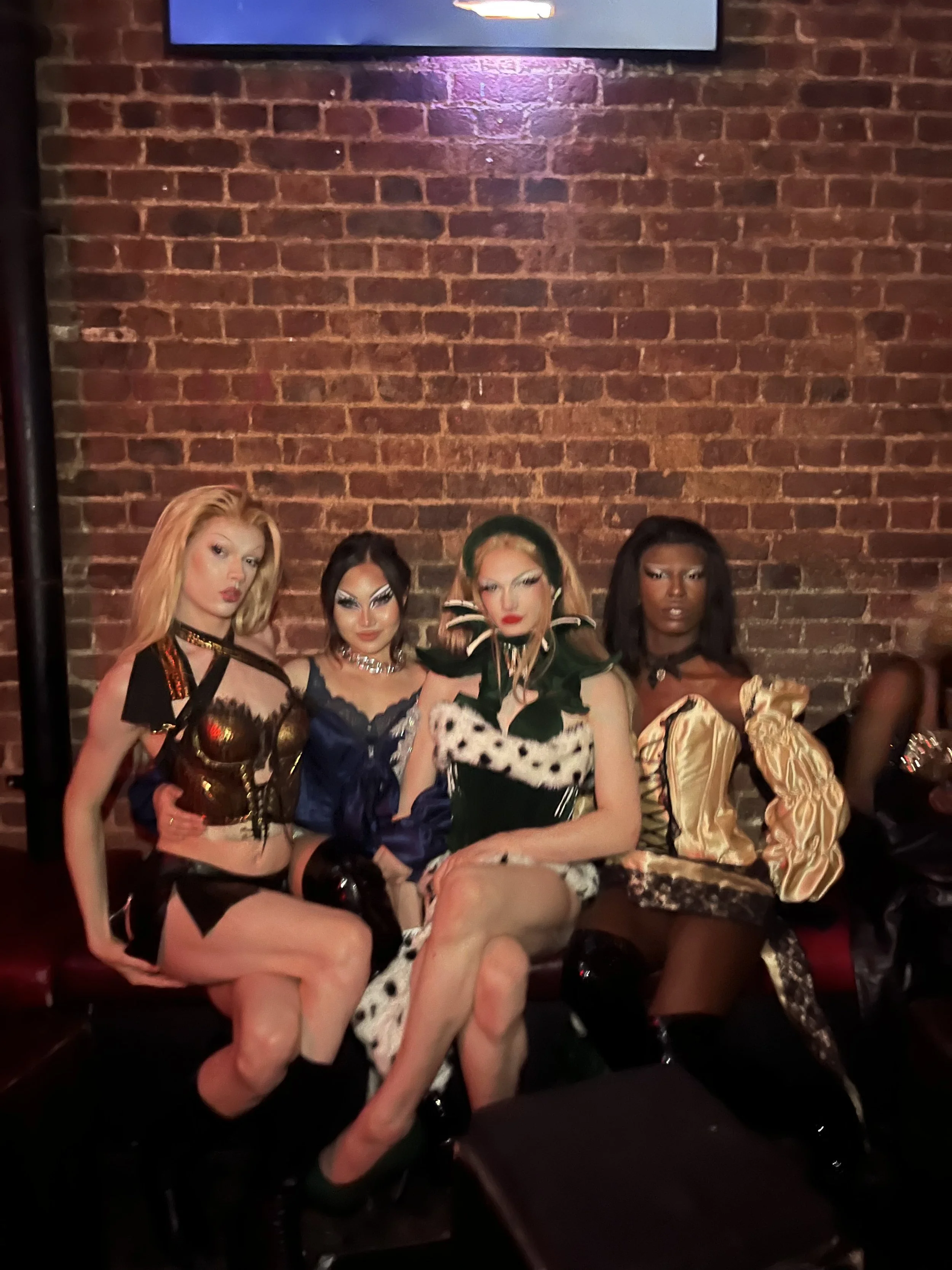 Wilma Hickey Heel in ‘Dalmation Jasper’ corset.
Pina Busch in ‘Kylie Minogue Kitty’ corset and black mini skirt. Blue Vespertine in Dark blue burlesque set and Lala Dangereuse in ‘Dangereuse in Heat’ Corset.