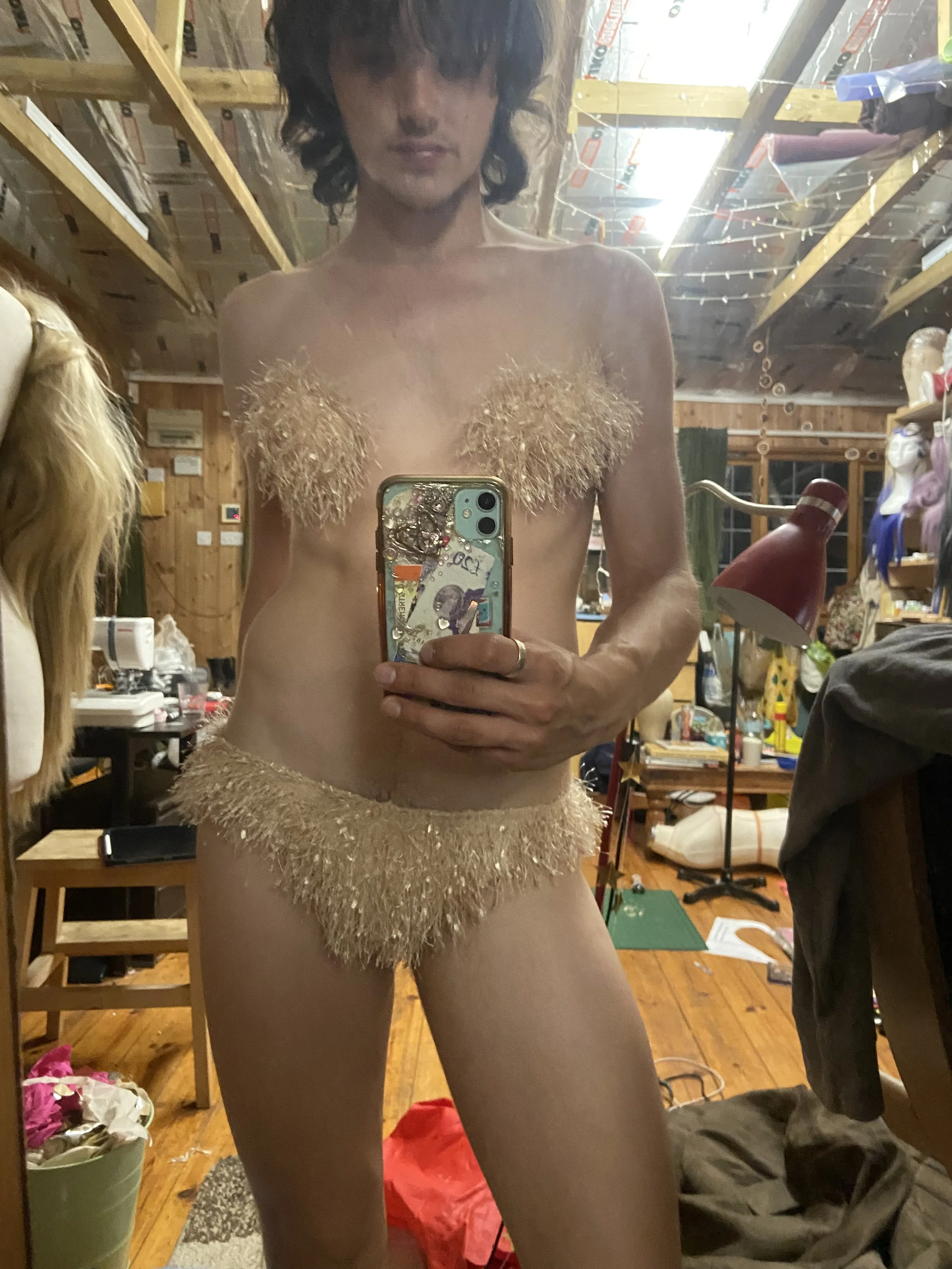 William. F. Henderson in fluffy gold two piece.