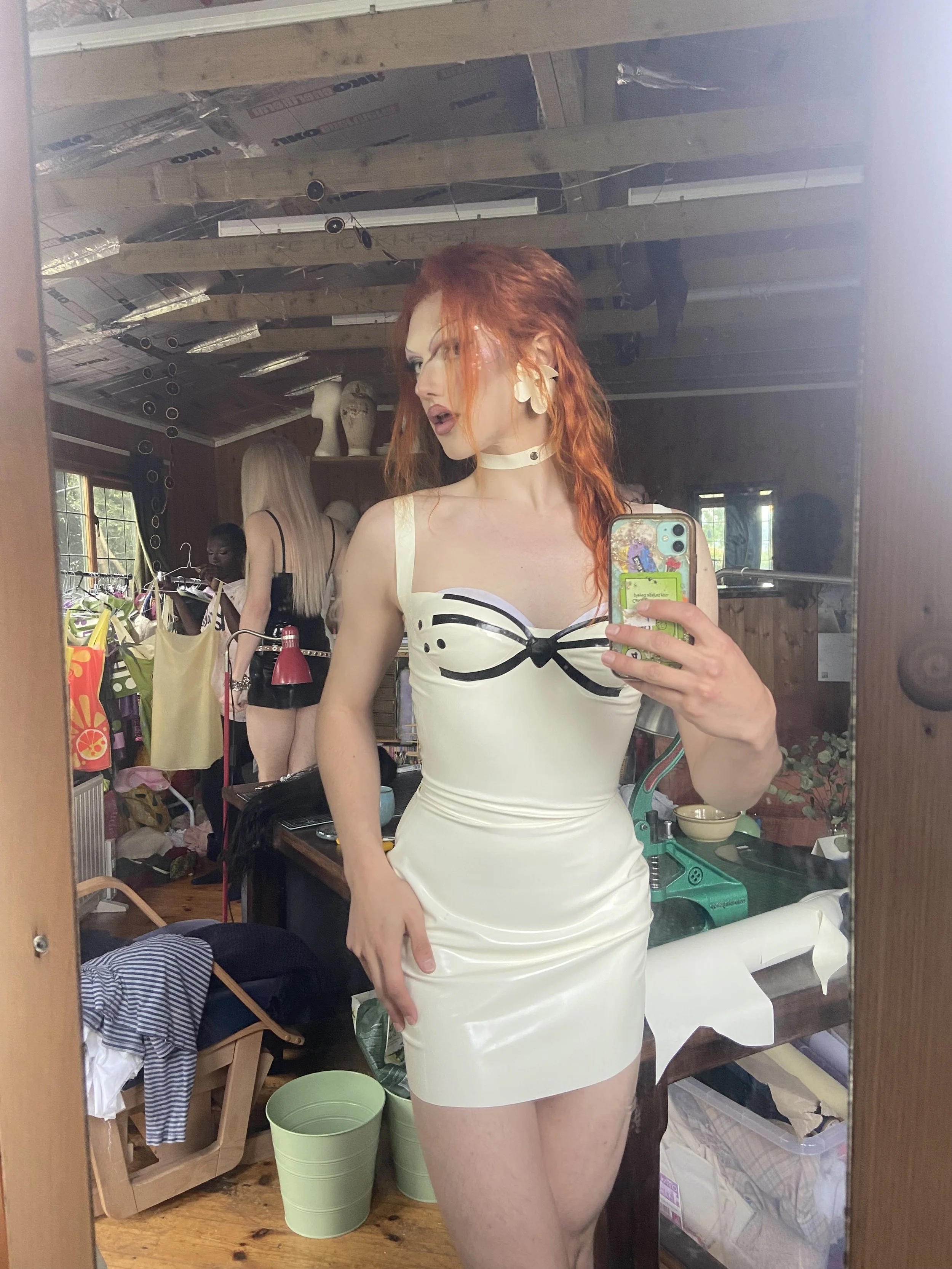 Wilma Hickey Heel wearing the feline latex Bunni slip dress.