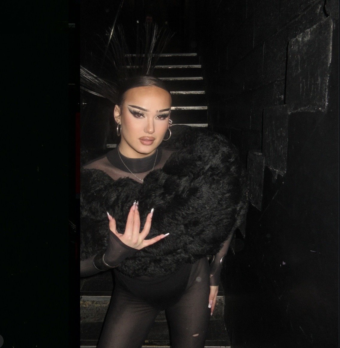 Kynn De Lynn in custom black fur puffer stoll.
