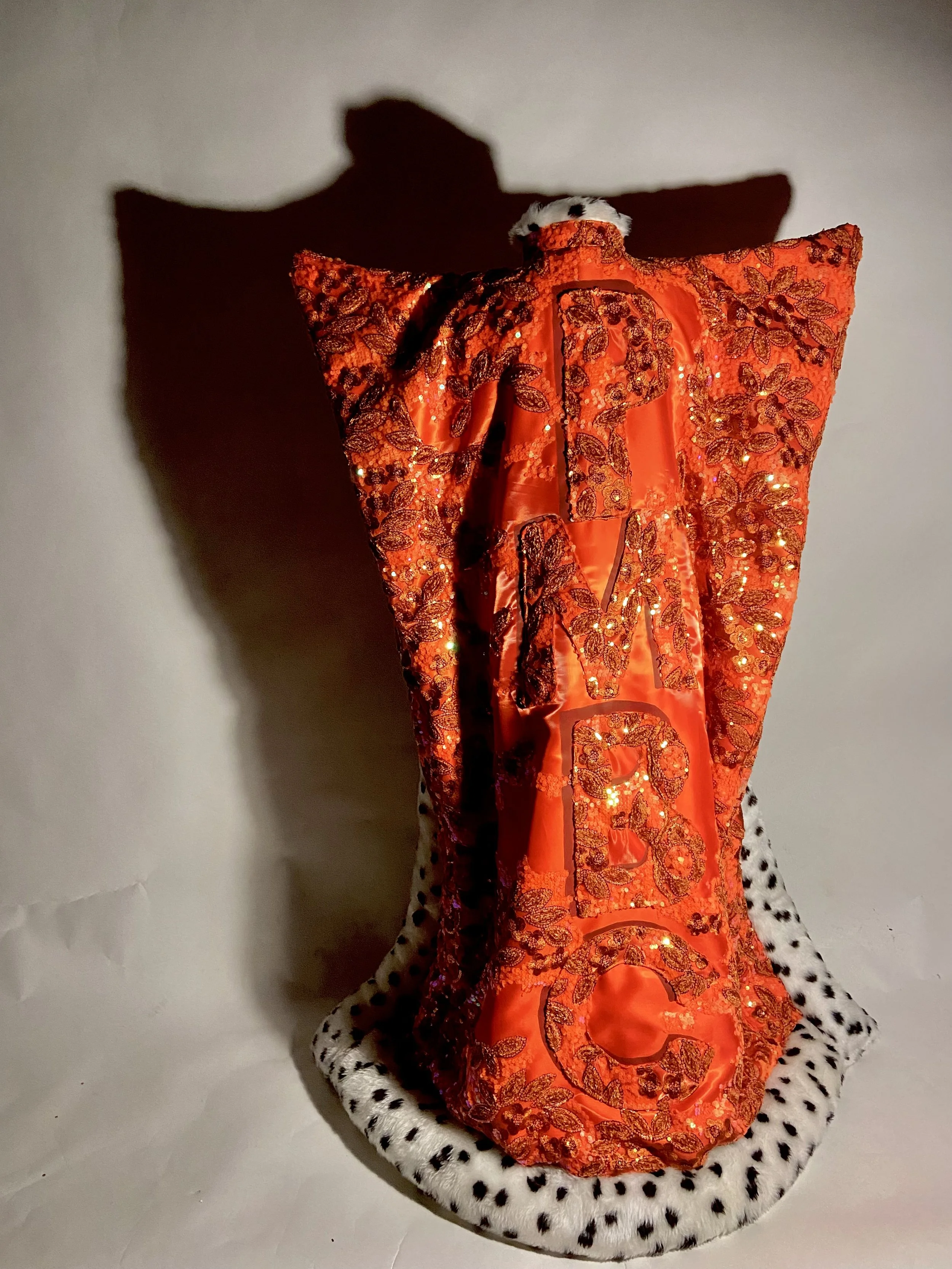 Royal Orange and Dalmatian cape for PMBC. Shot and retouched by William. F. Henderson.