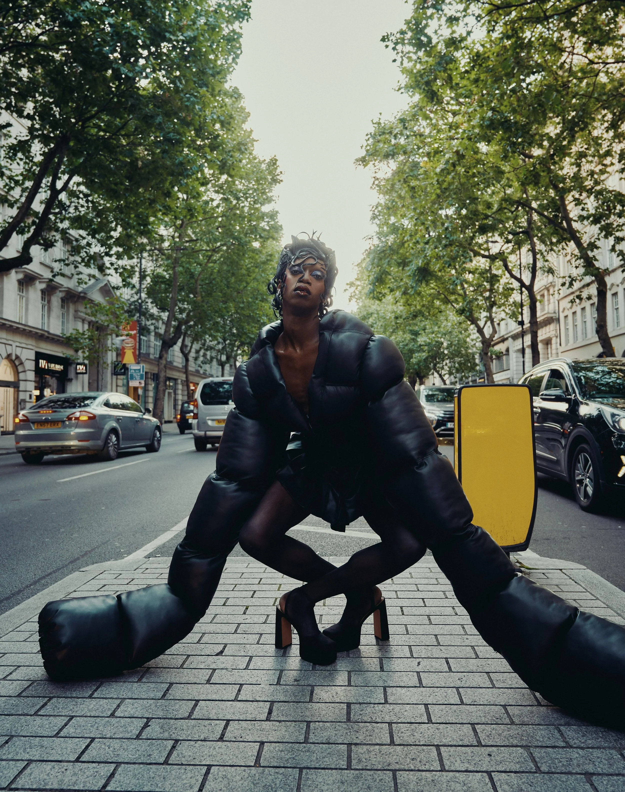 Black Peppa in ‘Black Puffer one-piece’ 
shot by Kim Lang