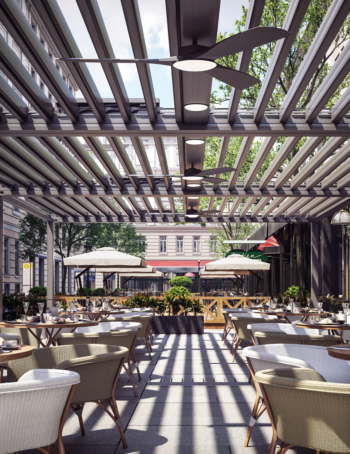 Outdoor restaurant patio with tables, chairs, and umbrellas, shaded by a pergola with ceiling fans, in an urban area with buildings and trees nearby.