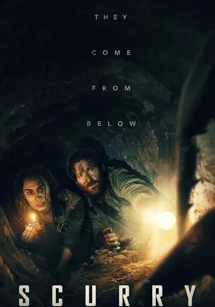 A man and woman inside a dark, underground tunnel with flashlights, looking up. Text overlay reads 'They come from below.'