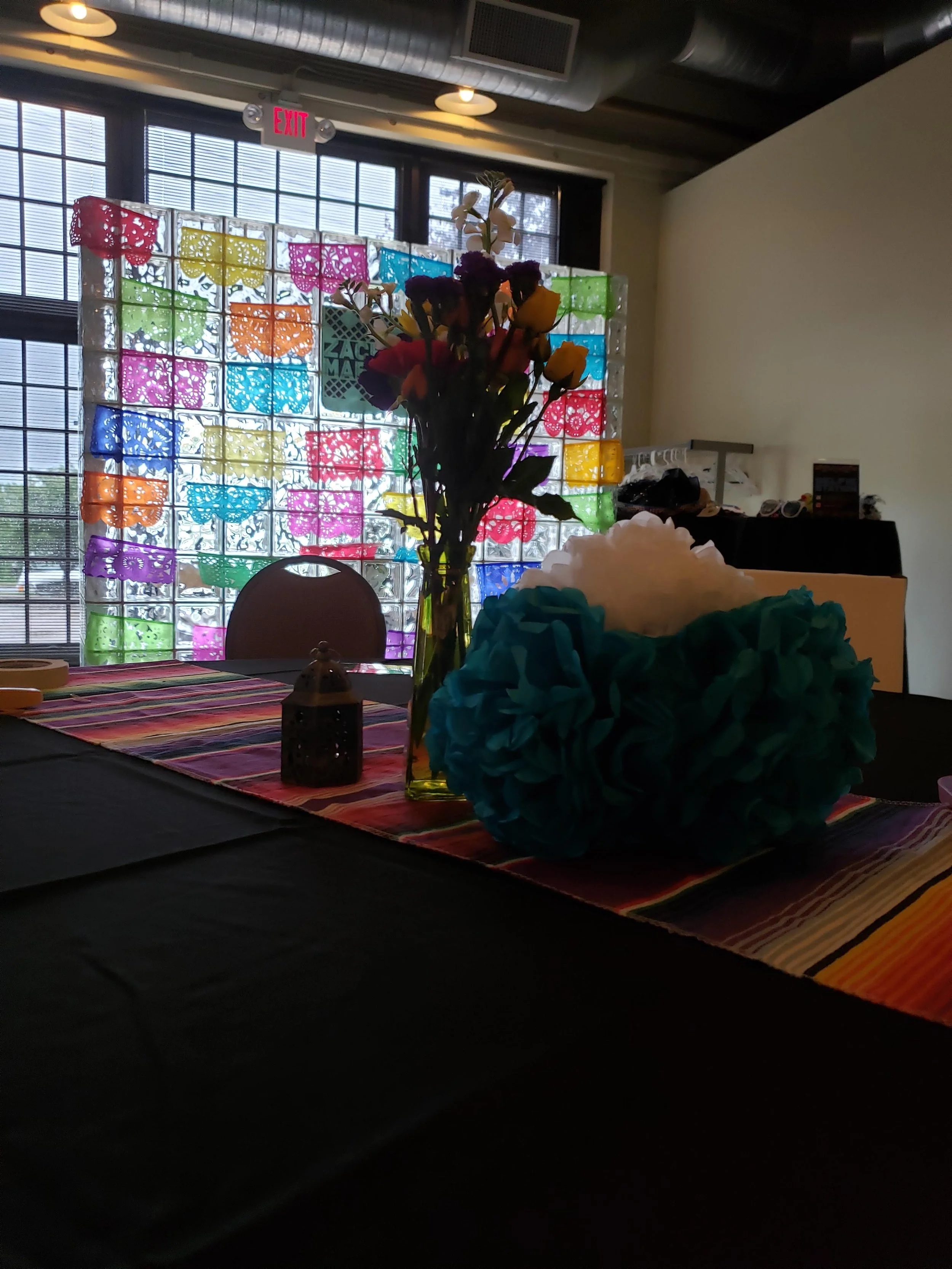 The final venue with our decorations, center pieces, and custom design work around the room. 
