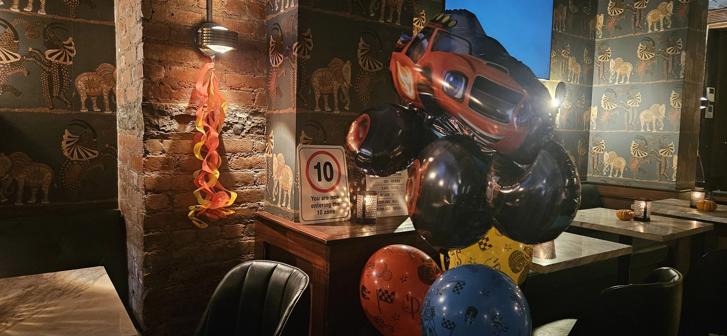 Birthday balloons and decor to match the 10th birthday vibe!