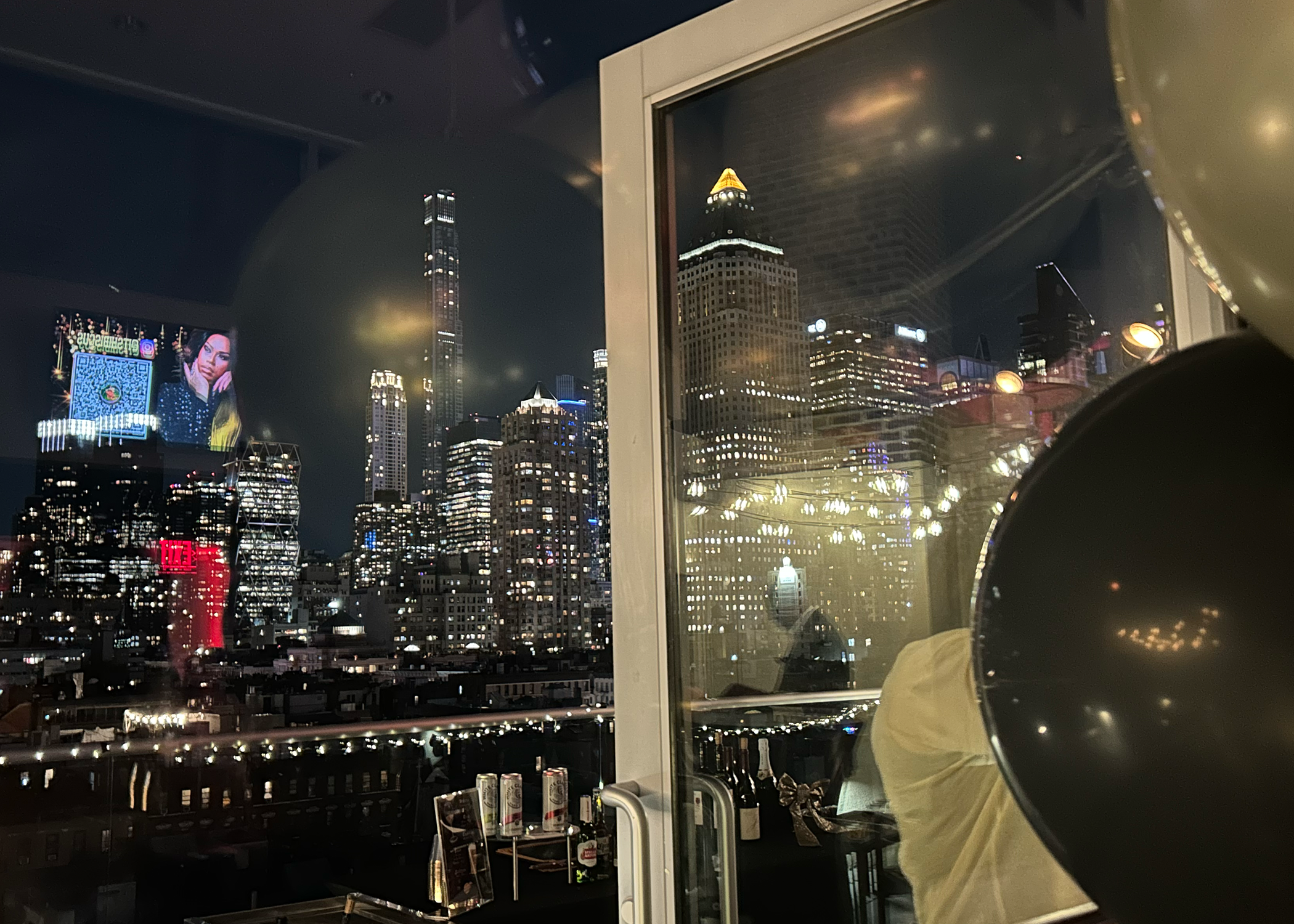 A view of the outside with the reflection of the screen in the background. 