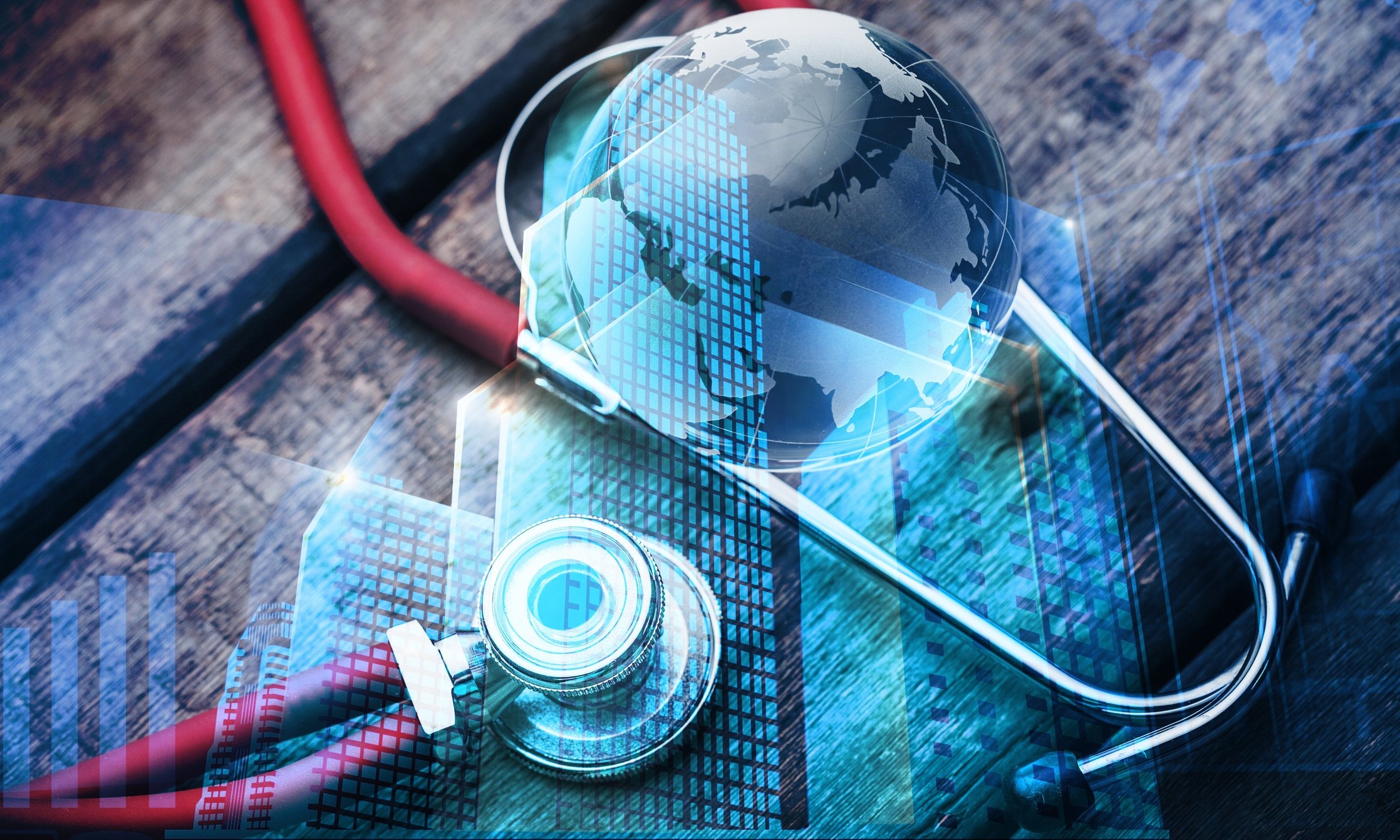 A digital illustration of a transparent globe overlaid with futuristic digital graphics, including holographic data, charts, and a fingerprint scanner, lying on a textured surface with a red cable nearby.