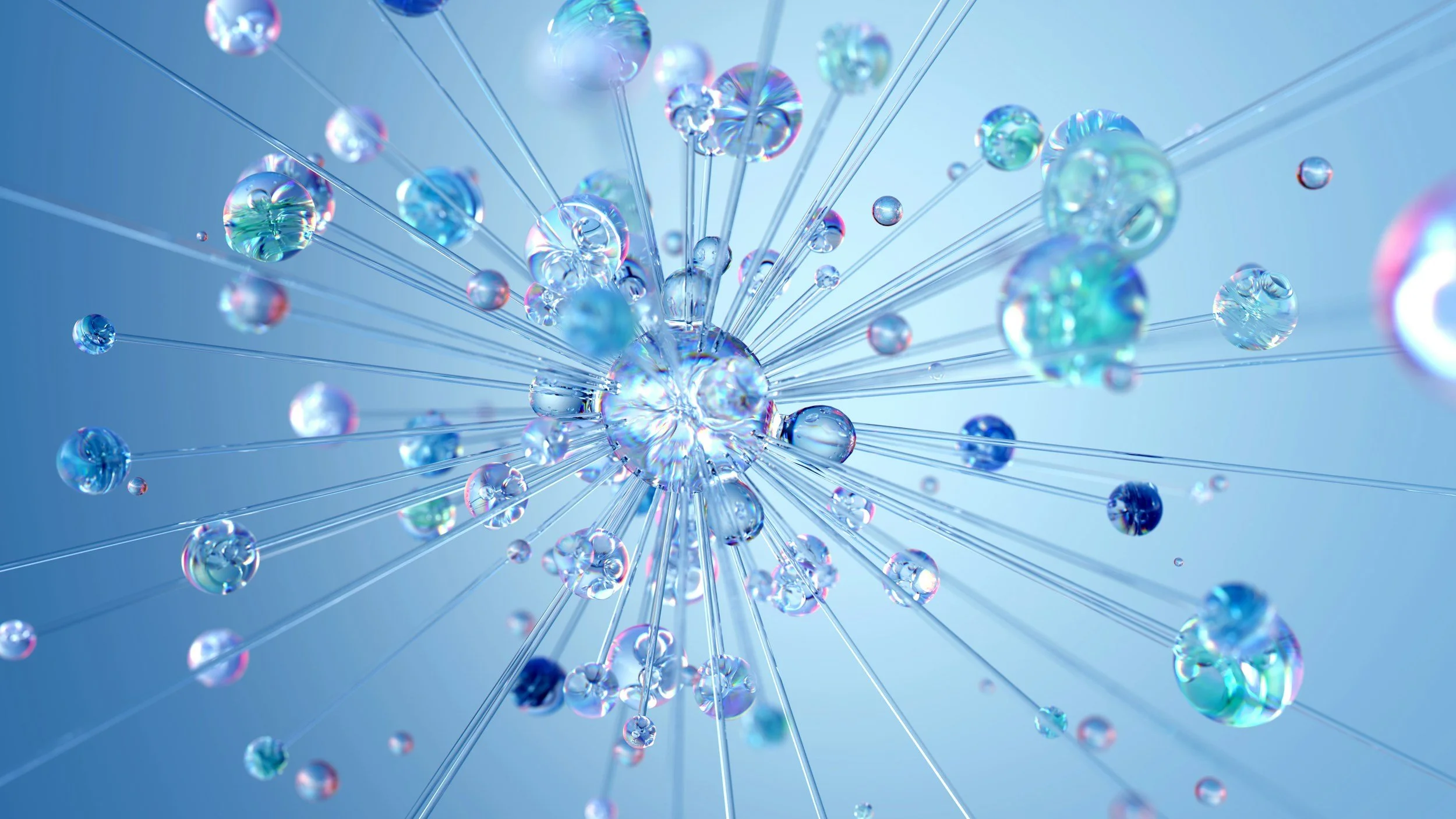 A digital illustration of numerous small iridescent spherical particles connected by thin transparent rods, creating a dynamic abstract composition with a blue background.