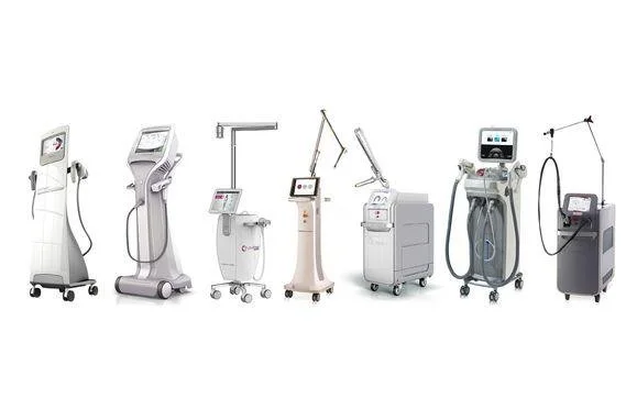 A lineup of various medical aesthetic devices used for skin treatments and fat reduction, including laser, radiofrequency, and cryolipolysis machines.