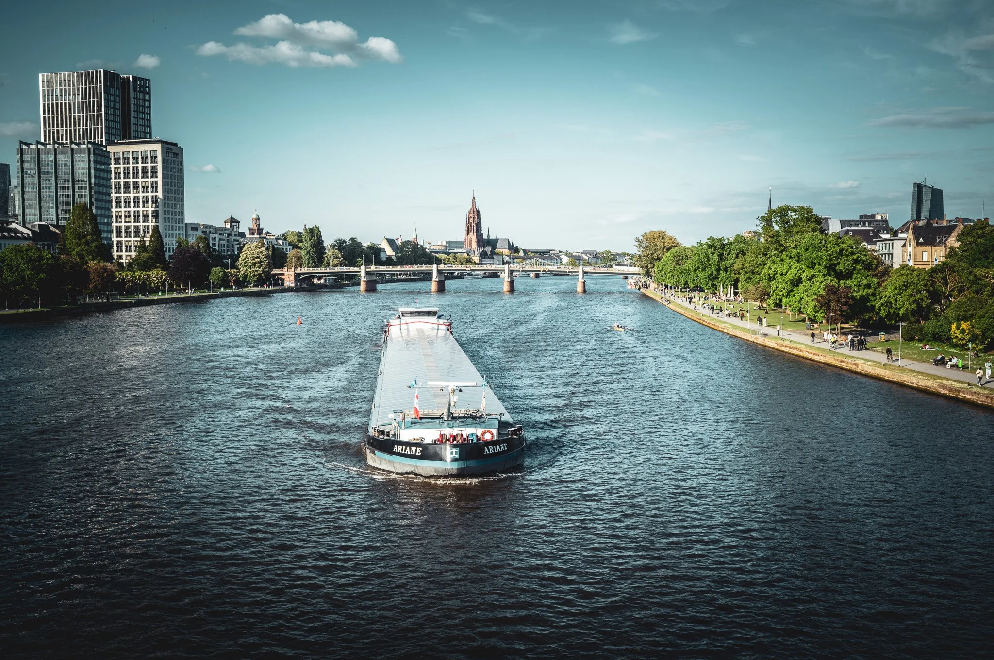 A quiet rhythm moves through Frankfurt as the River Main carries its vessels past the city’s skyline—where commerce, history, and calm coexist under the afternoon light. Shot by Leica M11 Summicron-M 1:2/35 | May,2025