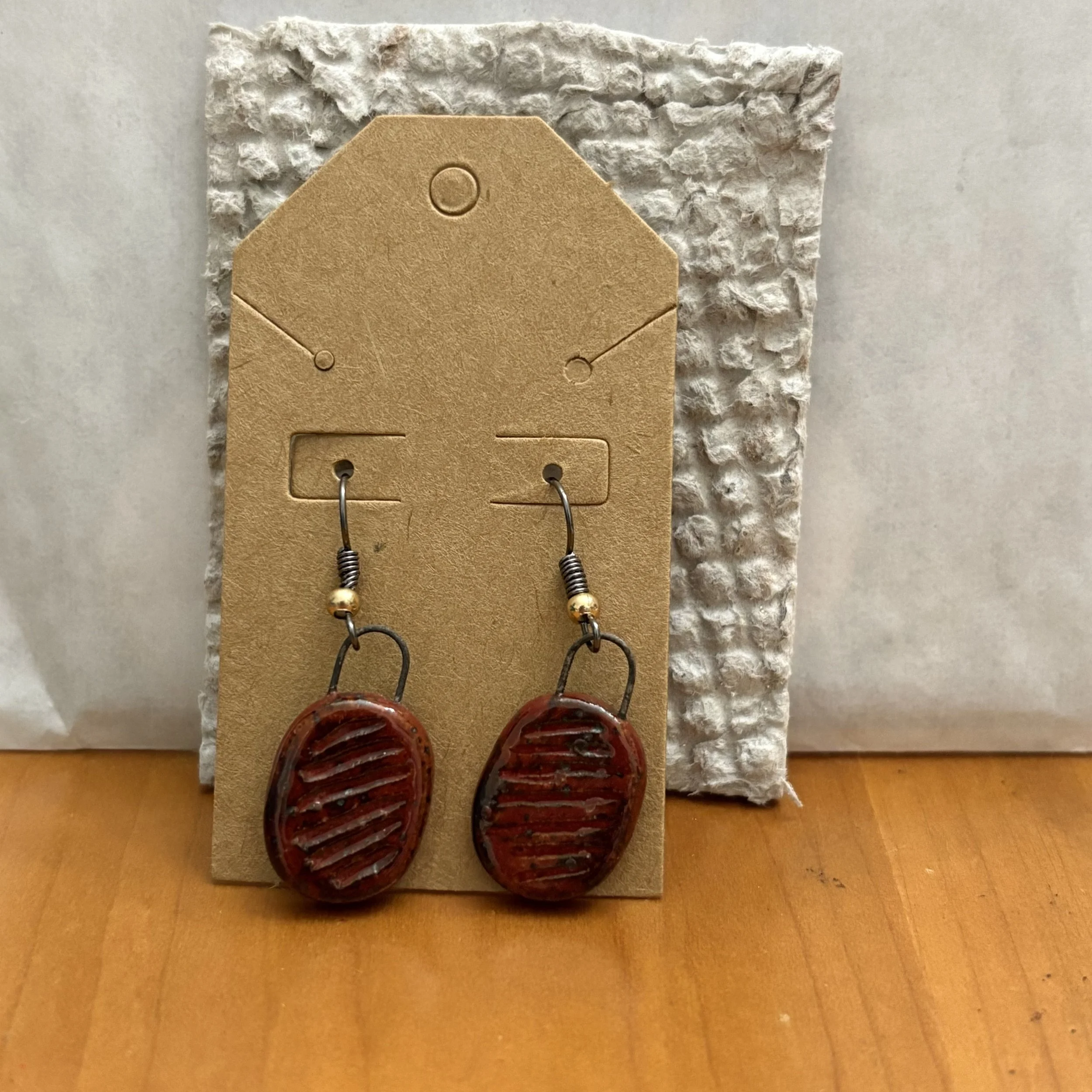 Cinnabar oval earrings